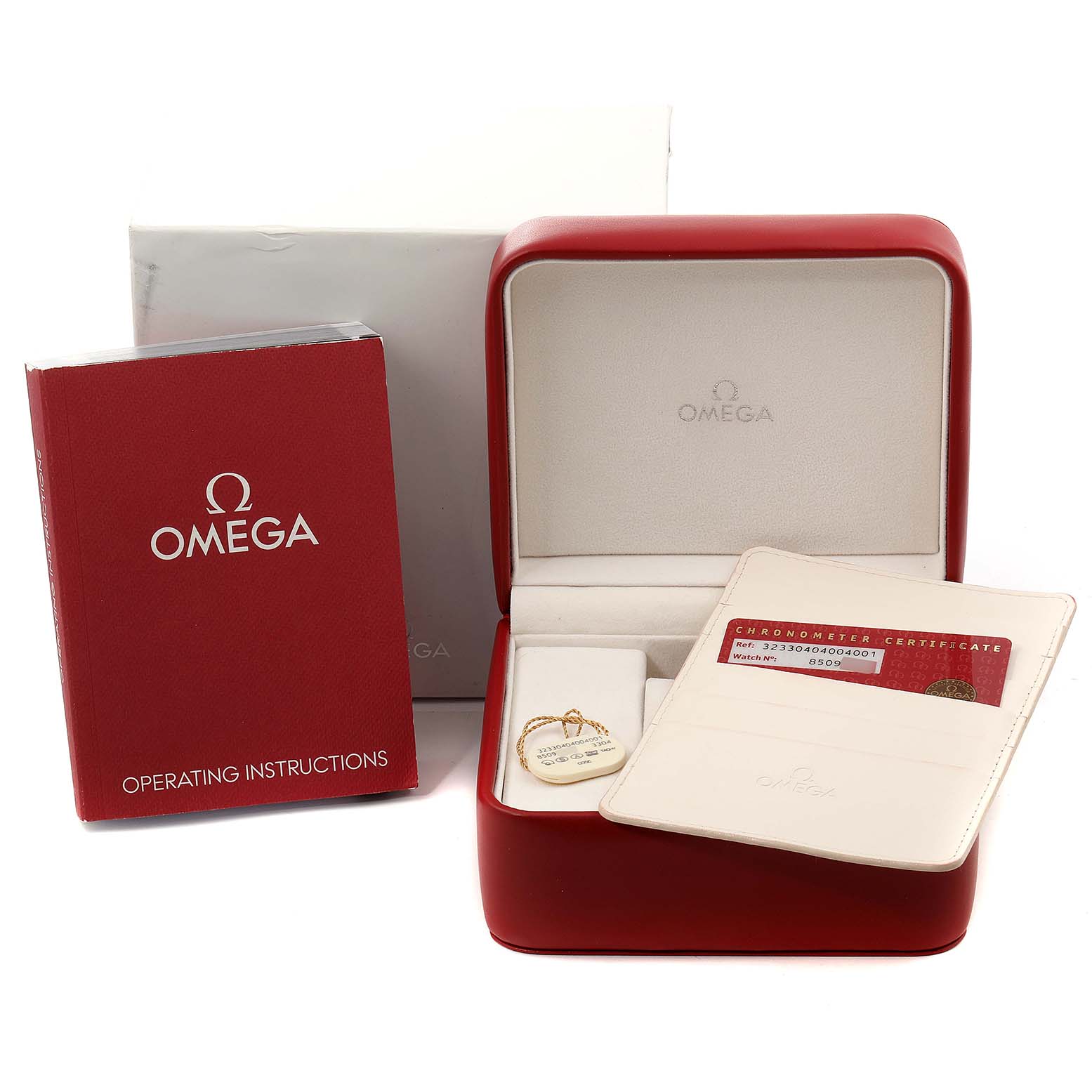 The image shows the packaging, operating instructions, and certificate for an Omega Speedmaster 323.30.40.40.04.001 Men's Stainless Steel White Dial 323.30.40.40.04.001 Men's Stainless Steel White Dial watch.