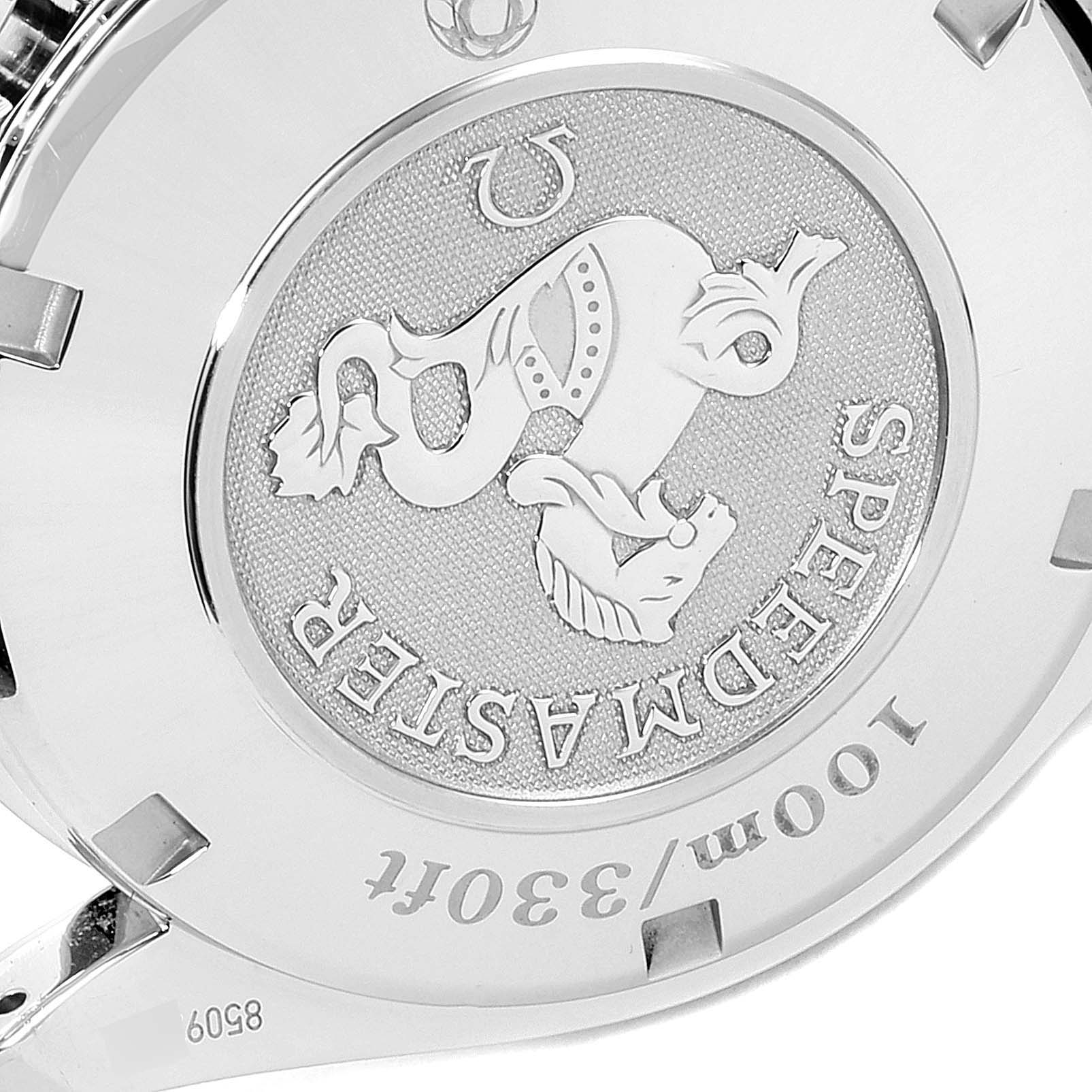 The image shows the engraved case back of an Omega Speedmaster 323.30.40.40.04.001 Men's Stainless Steel White Dial 323.30.40.40.04.001 Men's Stainless Steel White Dial watch.