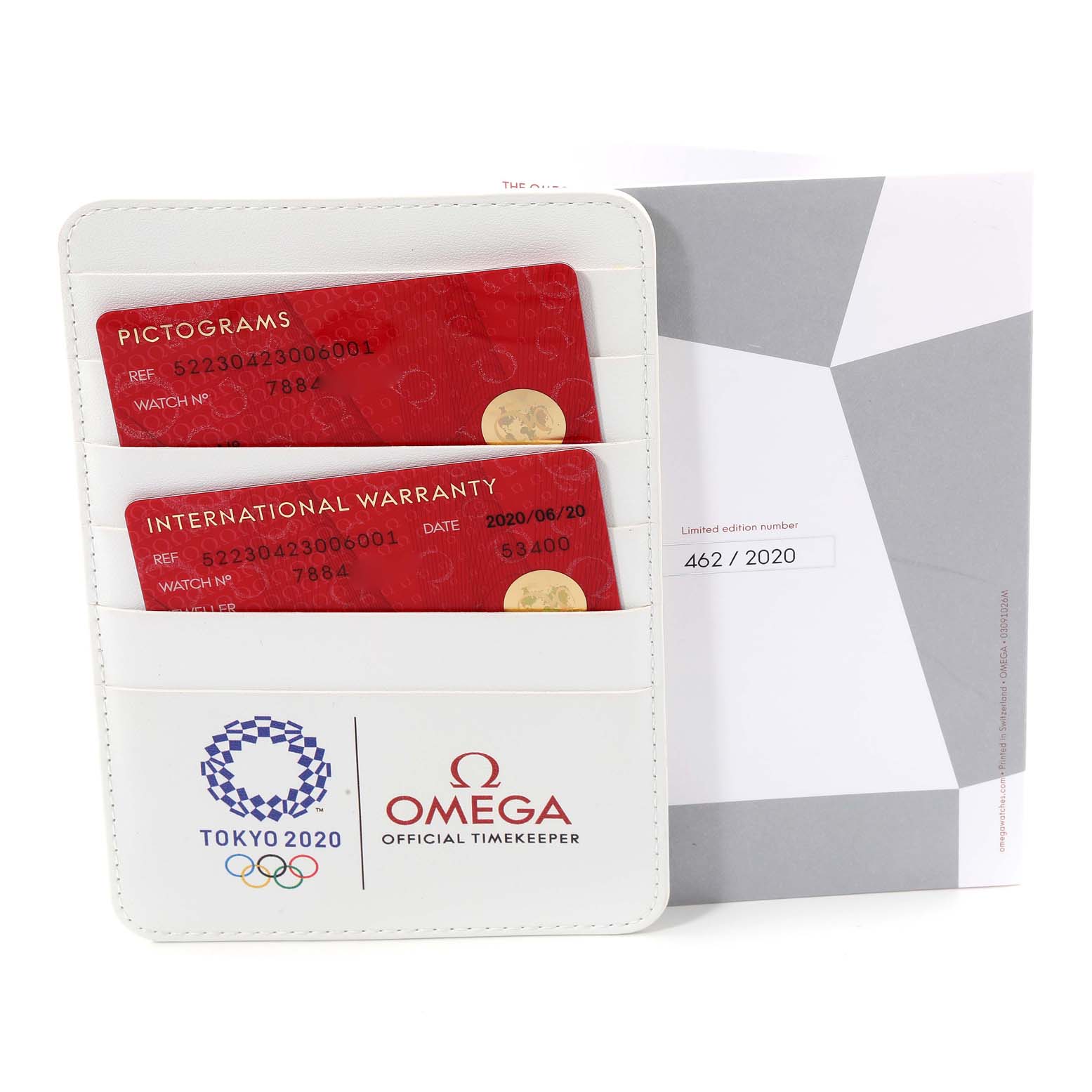 This image shows the warranty cards and limited edition certificate for the Omega Speedmaster 522.30.42.30.06.001 Men's Stainless Steel Silver Dial 522.30.42.30.06.001 Men's Stainless Steel Silver Dial watch, neatly placed in a holder.