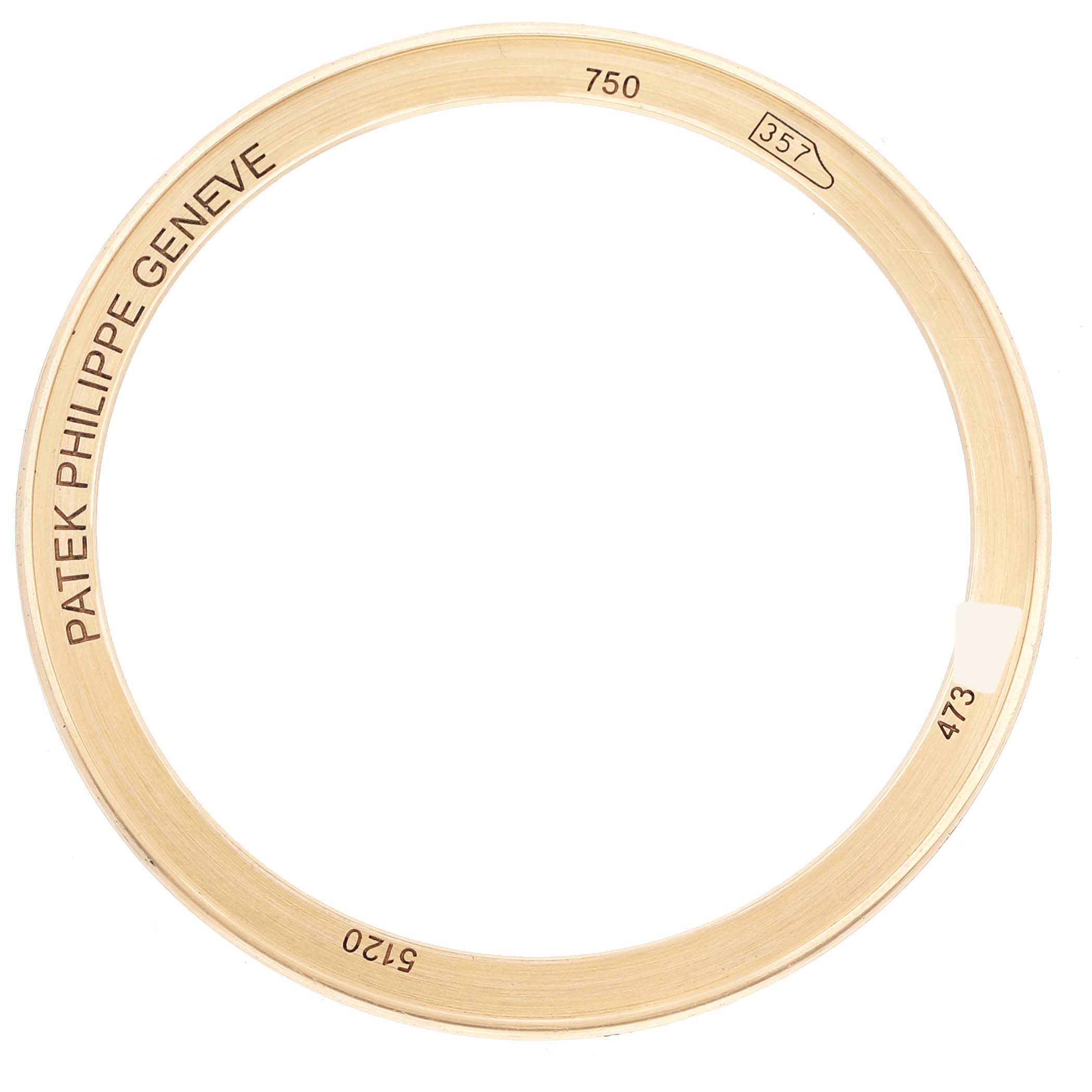 This image shows a bezel component of a Patek Philippe Calatrava 5120J Men's Yellow Gold White Dial 5120J Men's Yellow Gold White Dial watch, viewed from a top-down angle.