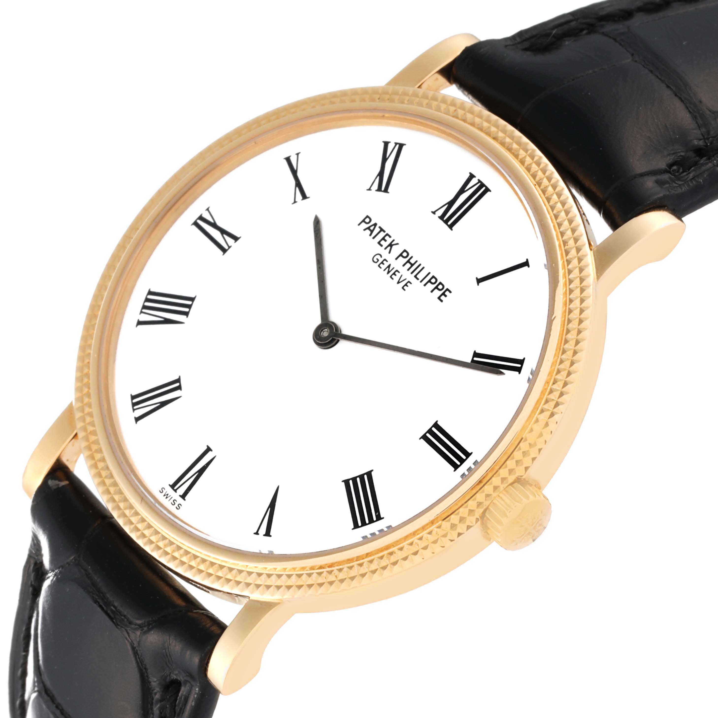 This image shows a Patek Philippe Calatrava 5120J Men's Yellow Gold White Dial 5120J Men's Yellow Gold White Dial watch at an angled view, highlighting the dial, bezel, and part of the leather strap.