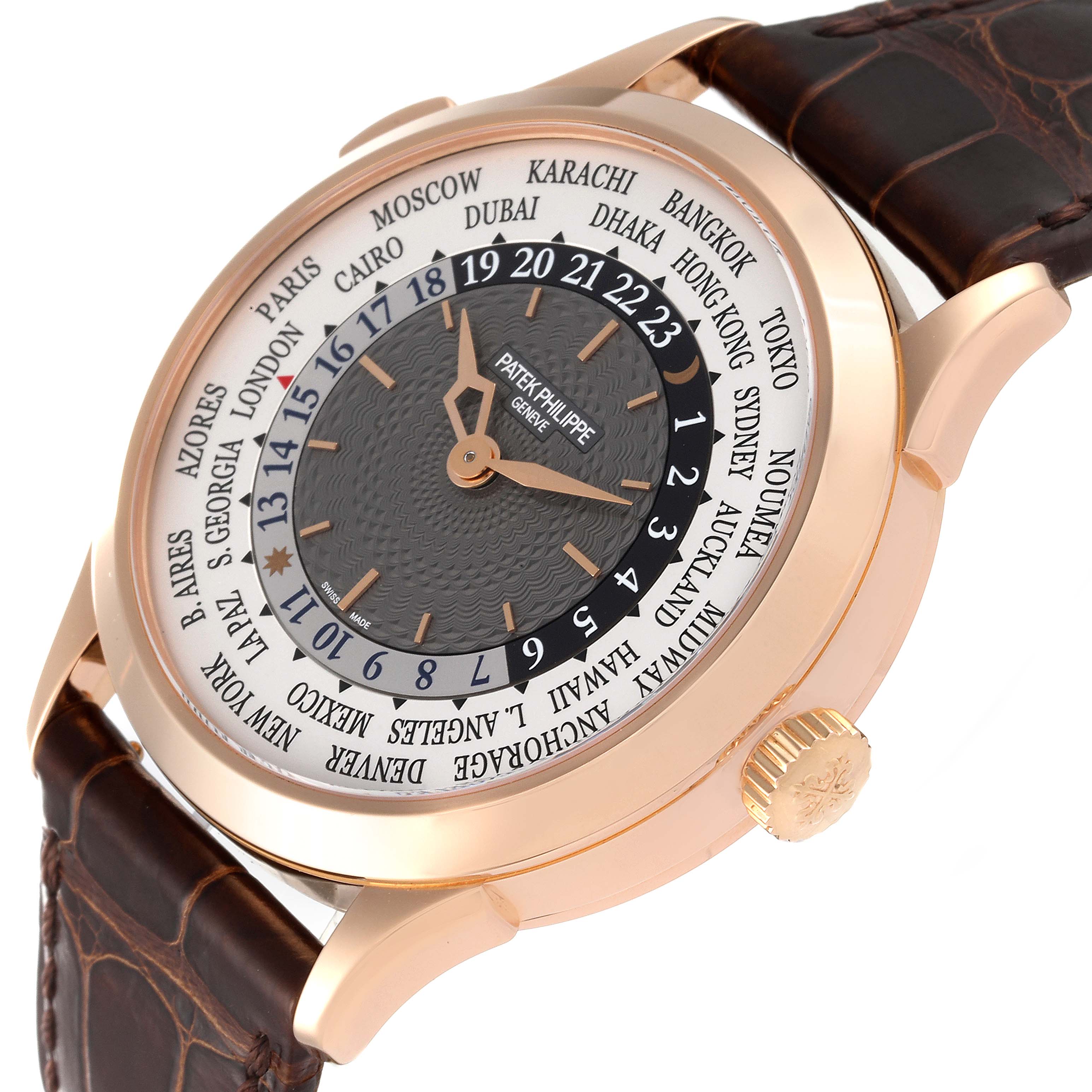 The image shows a close-up side angle of the Patek Philippe Complications 5230R Men's Rose Gold Grey Dial 5230R Men's Rose Gold Grey Dial watch, highlighting the case, crown, and world time dial.