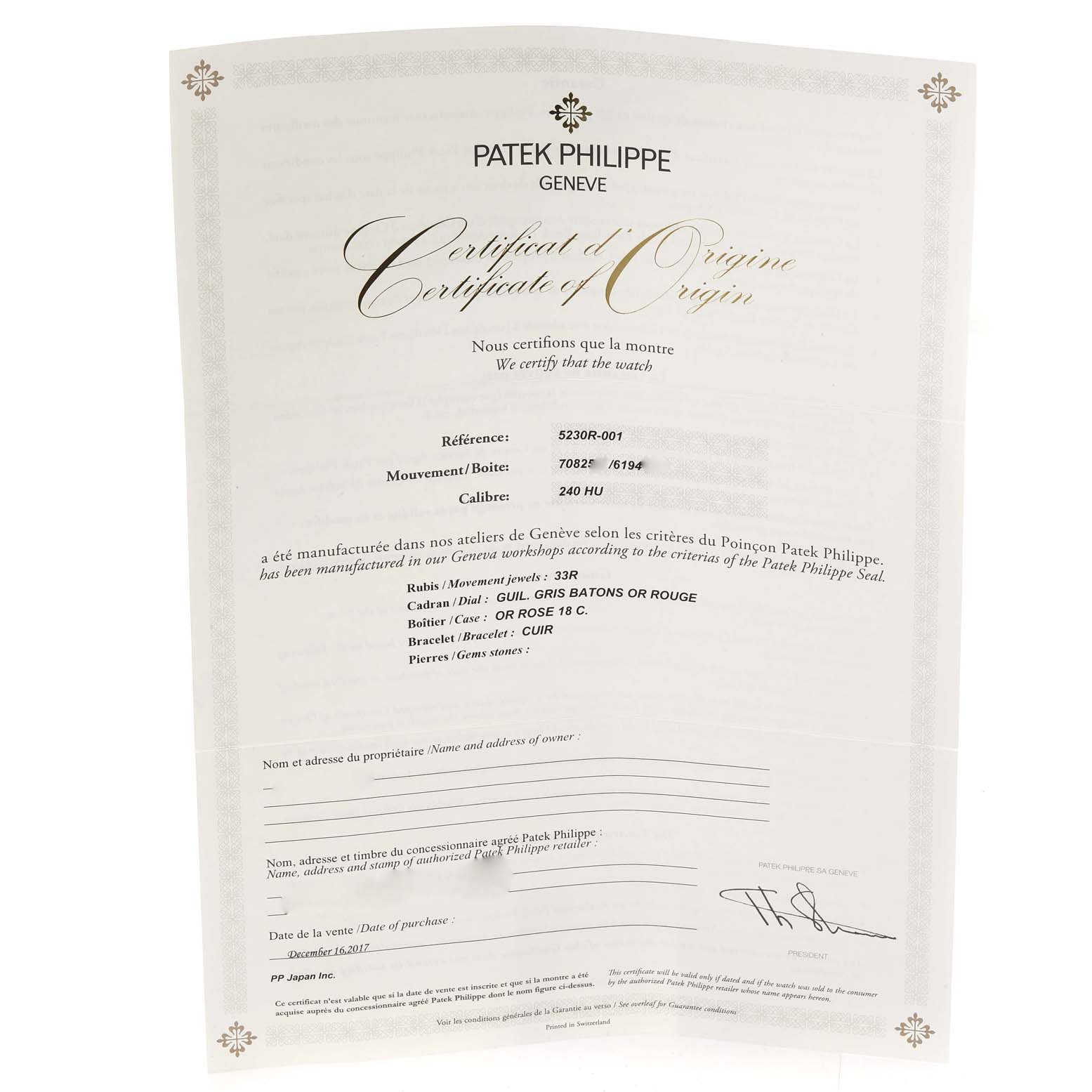 This image shows a Certificate of Origin for the Patek Philippe Complications 5230R Men's Rose Gold Grey Dial 5230R Men's Rose Gold Grey Dial model 5230R-001.