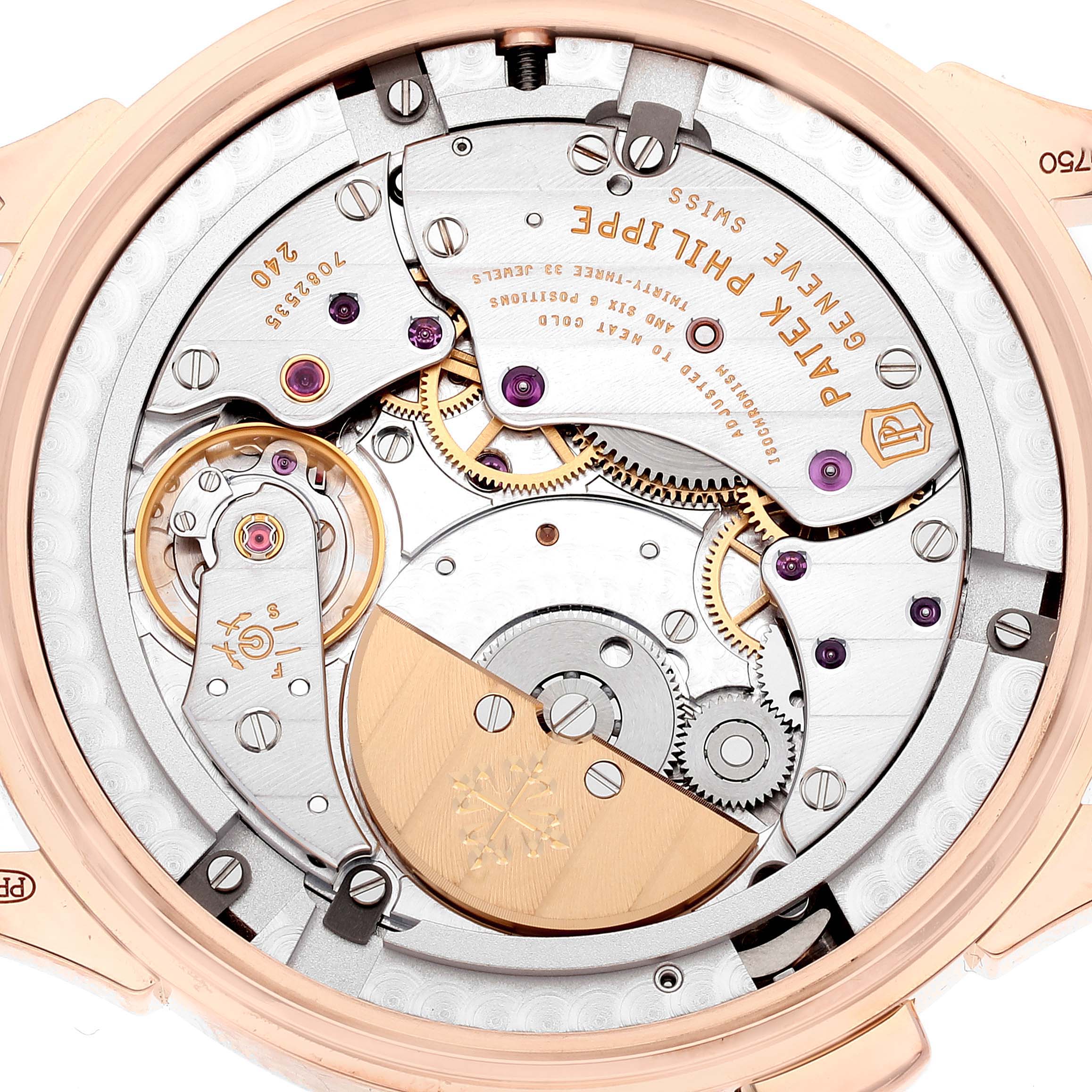 This image shows the back view of a Patek Philippe Complications 5230R Men's Rose Gold Grey Dial 5230R Men's Rose Gold Grey Dial watch, revealing intricate inner mechanical parts.