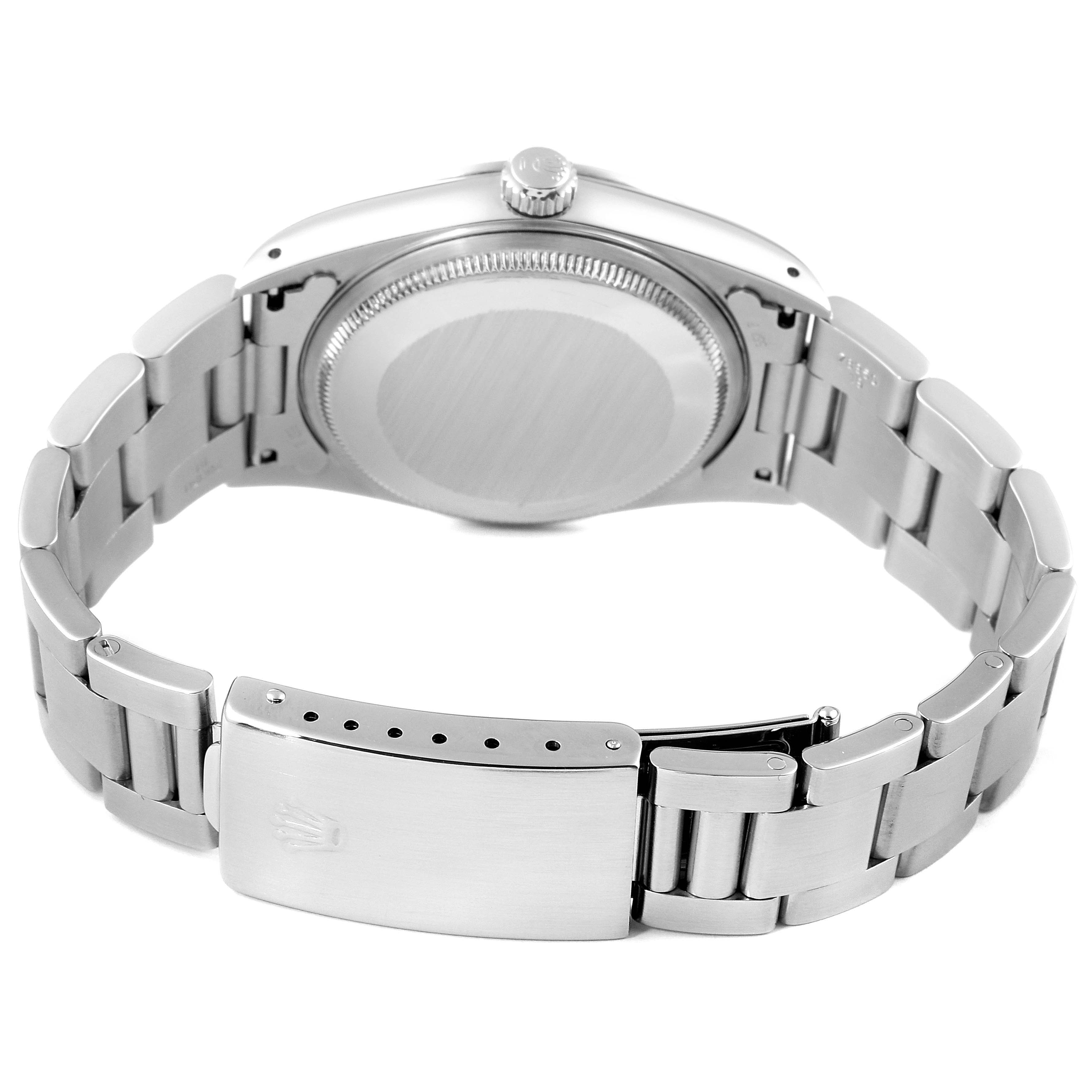 The image shows the back view of a Rolex Air-King 14000 Men's Stainless Steel Black Dial 14000 Men's Stainless Steel Black Dial watch, featuring the case back and bracelet with clasp.