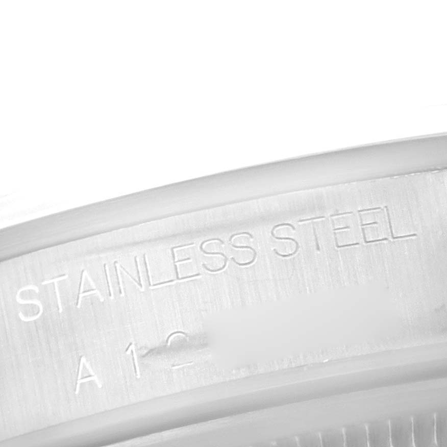 This is a close-up image showing the "Stainless Steel" engraving inside the Rolex Air-King 14000 Men's Stainless Steel Pink Dial 14000 Men's Stainless Steel Pink Dial watch's case back.