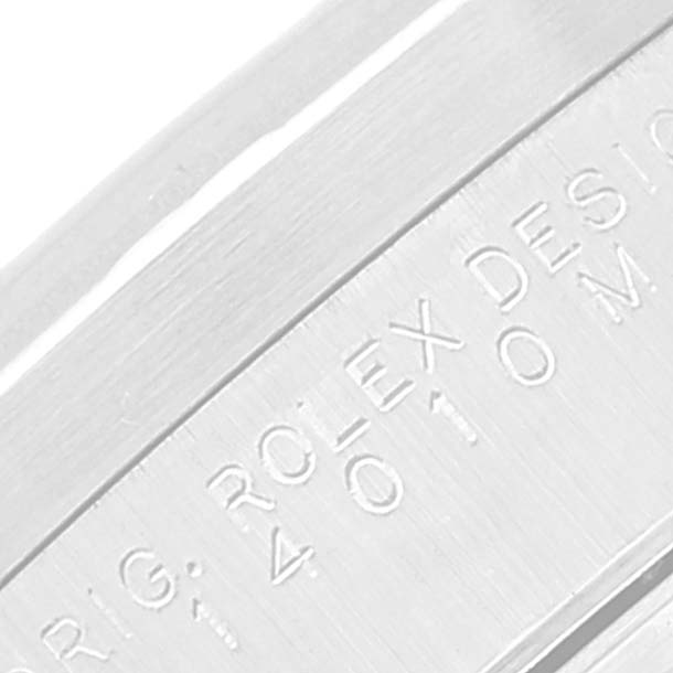 This close-up image shows the engravings on the side of the Rolex Air-King 14010 Men's Stainless Steel Blue Dial 14010 Men's Stainless Steel Blue Dial watch case.