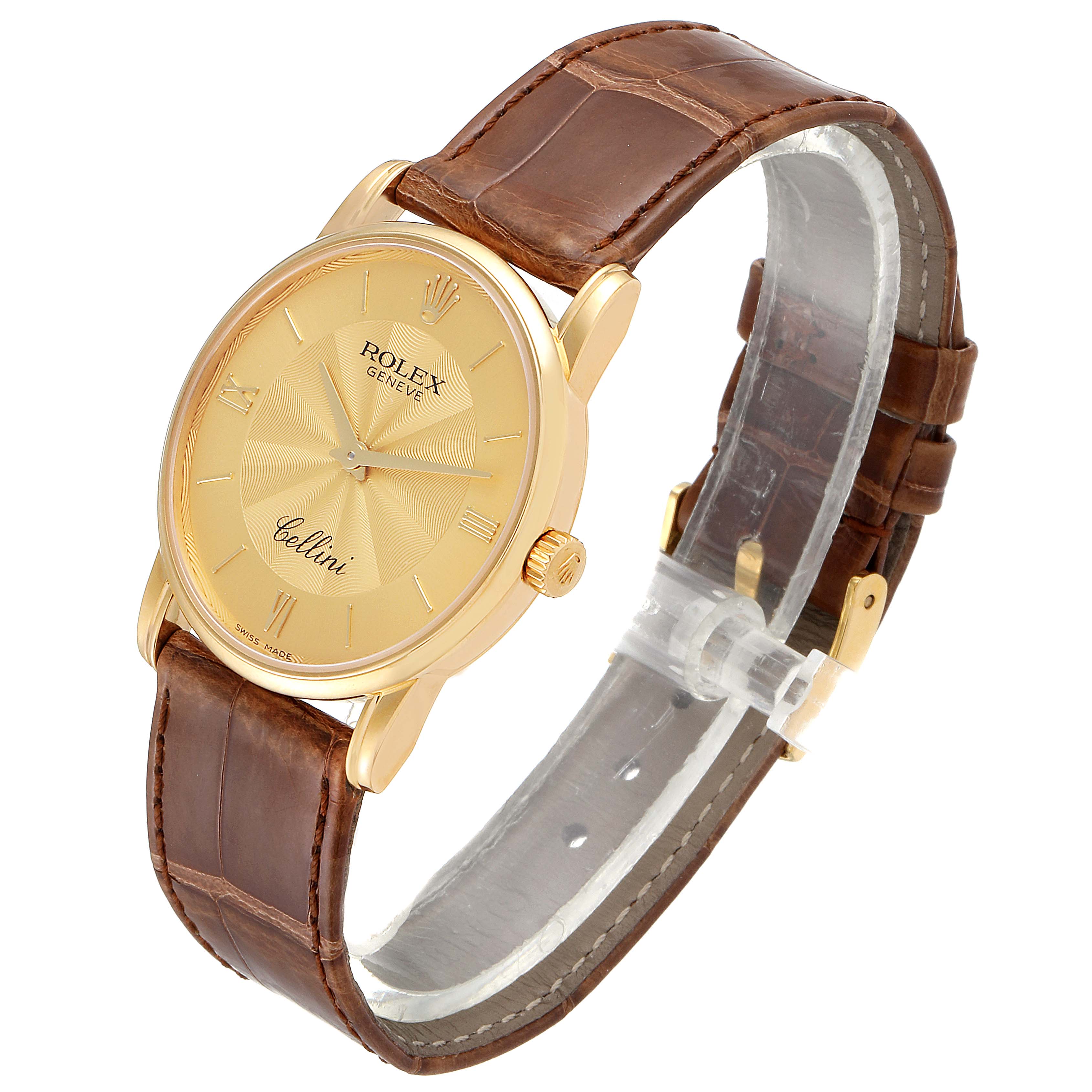 This image shows a side and partial overhead view of the Rolex Cellini 5116 Men's Yellow Gold Champagne Dial 5116 Men's Yellow Gold Champagne Dial watch, highlighting its gold case and brown leather strap.