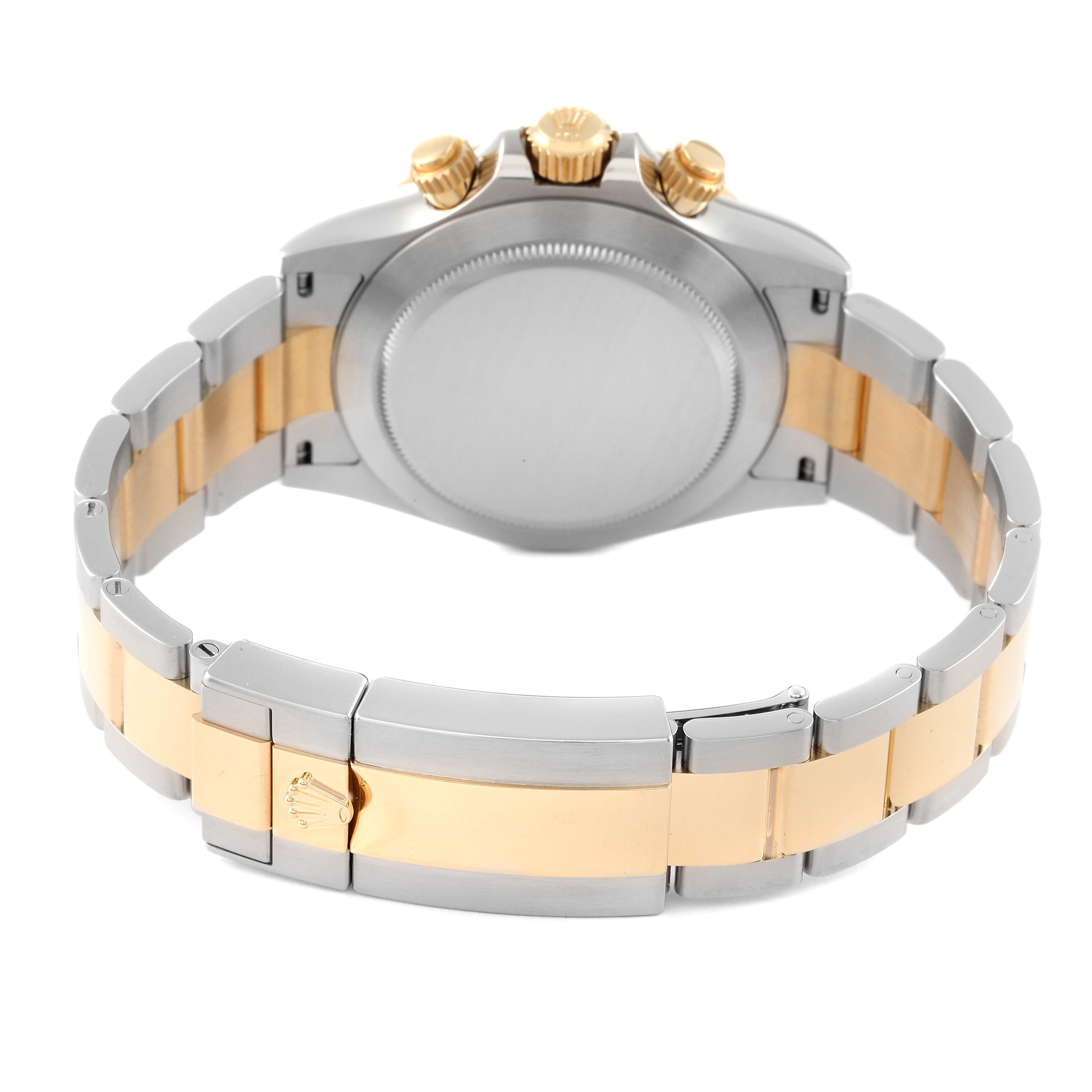 The image shows the back view of a Rolex Daytona 116503 Men's Steel and Gold (two tone) Champagne Dial 116503 Men's Steel and Gold (two tone) Champagne Dial watch, highlighting the bracelet, clasp, and case back.