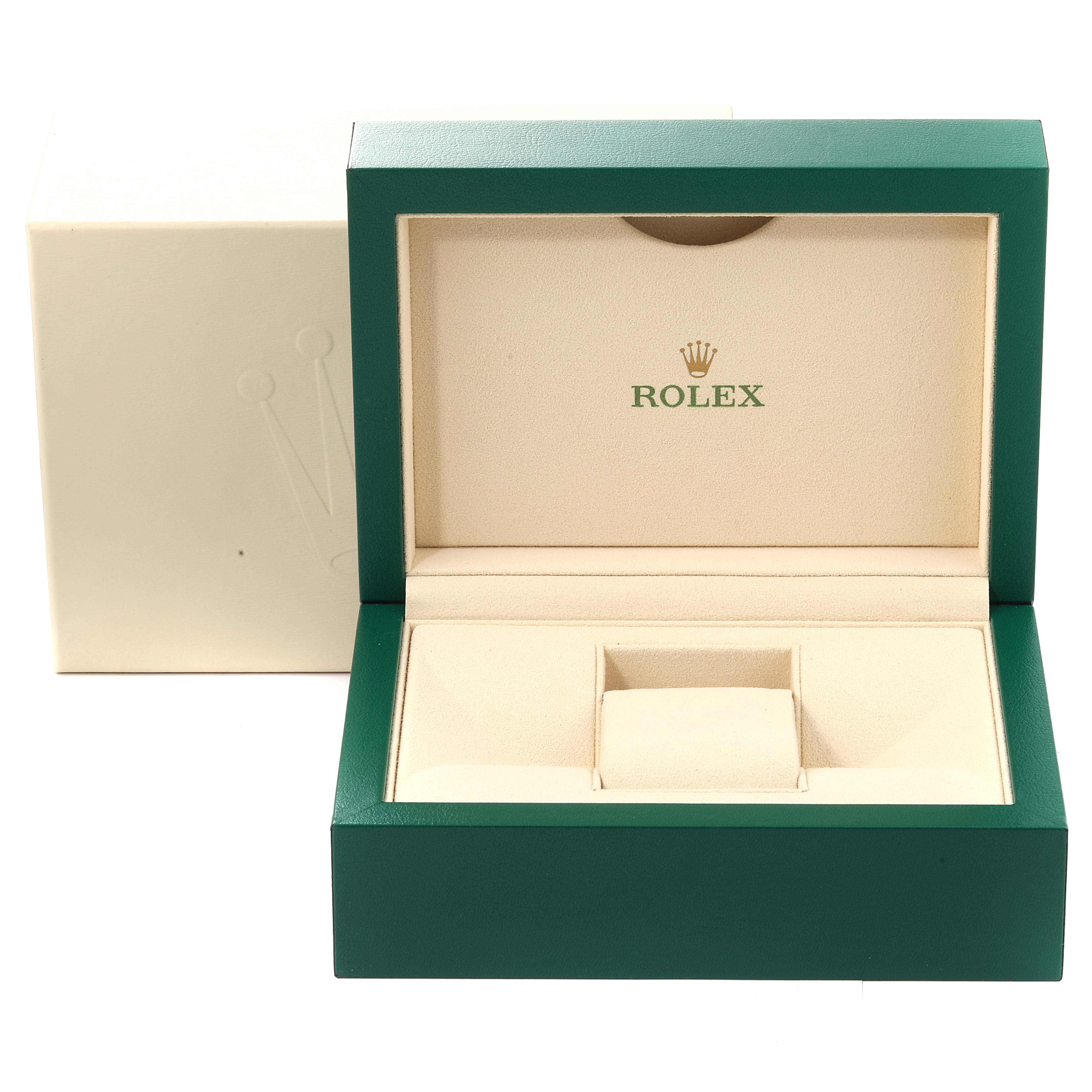 The image shows an open Rolex watch box with beige interior, designed for the Daytona model.