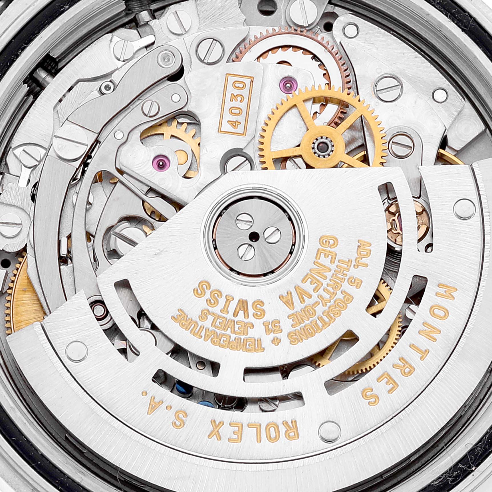 The image shows the detailed internal mechanism and movement parts of a Rolex Daytona 16520 Men's Stainless Steel Black Dial 16520 Men's Stainless Steel Black Dial watch.