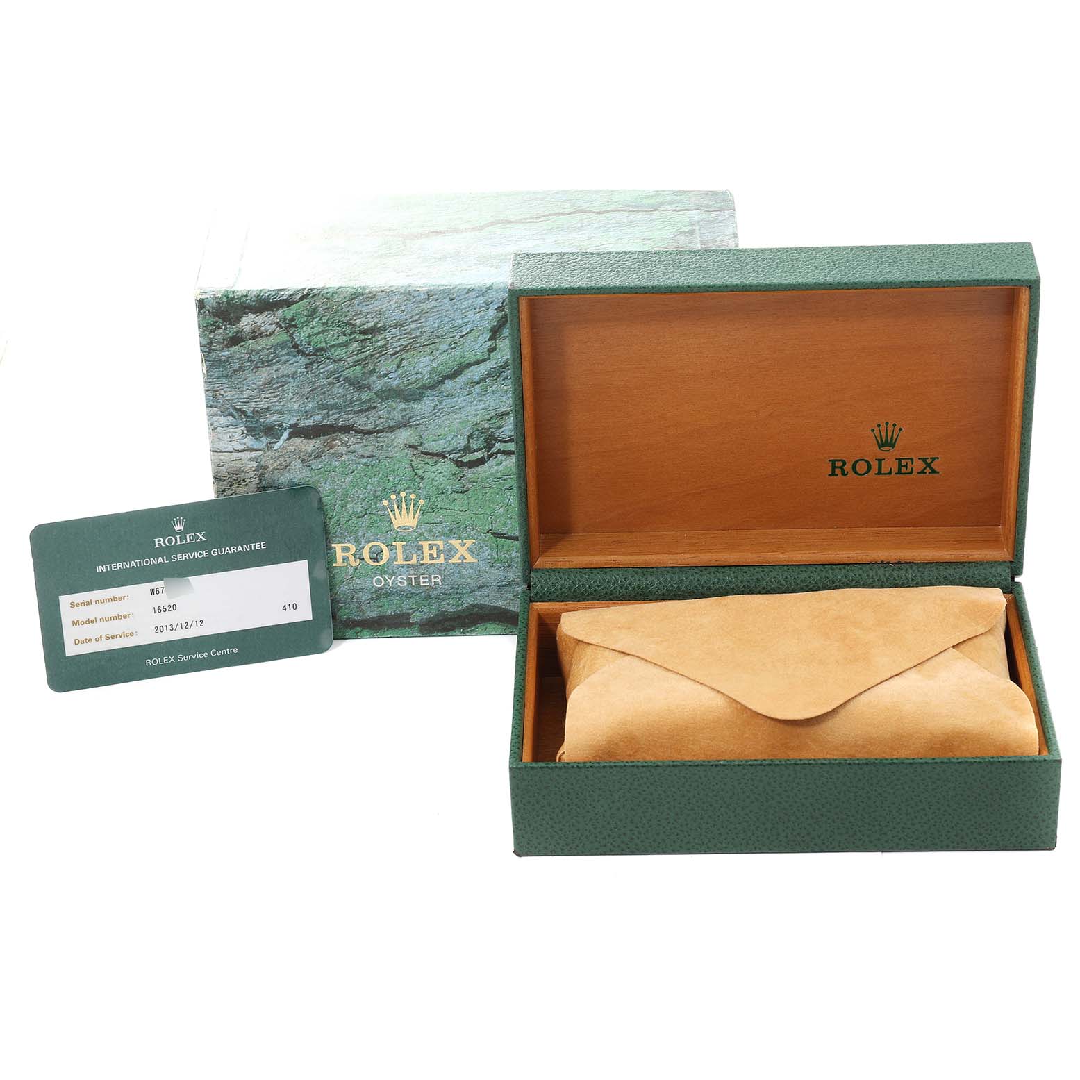 The image shows a Rolex Daytona 16520 Men's Stainless Steel Black Dial 16520 Men's Stainless Steel Black Dial box set with an open case, outer box, and an international service guarantee card.