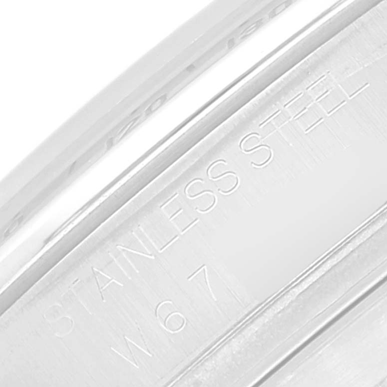 This close-up image shows the inner part of the Rolex Daytona 16520 Men's Stainless Steel Black Dial 16520 Men's Stainless Steel Black Dial watch band, highlighting the "Stainless Steel" engraving.