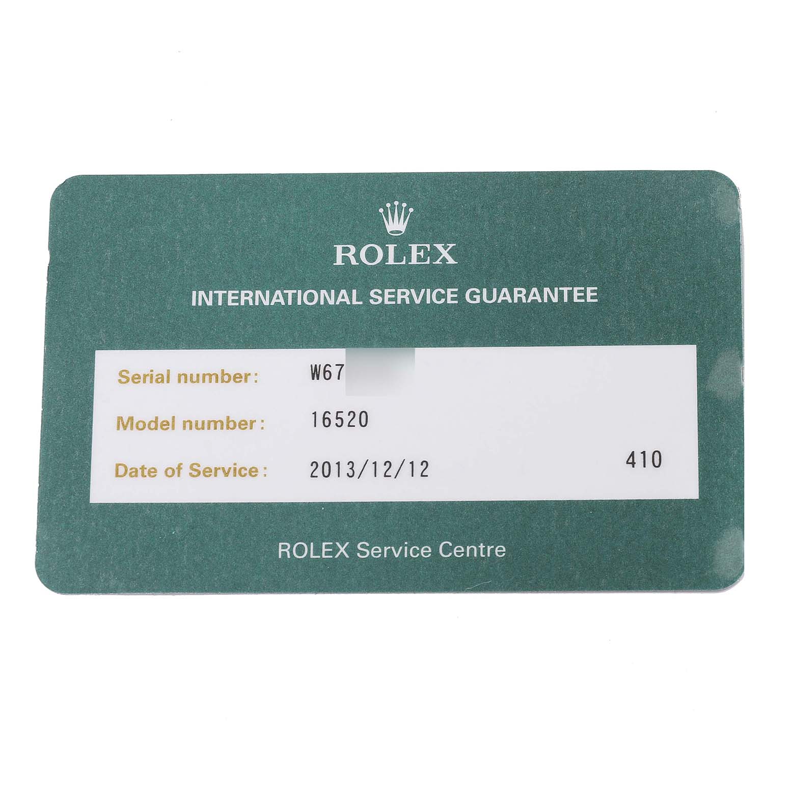 The image shows an International Service Guarantee card for a Rolex Daytona 16520 Men's Stainless Steel Black Dial 16520 Men's Stainless Steel Black Dial model 16520.