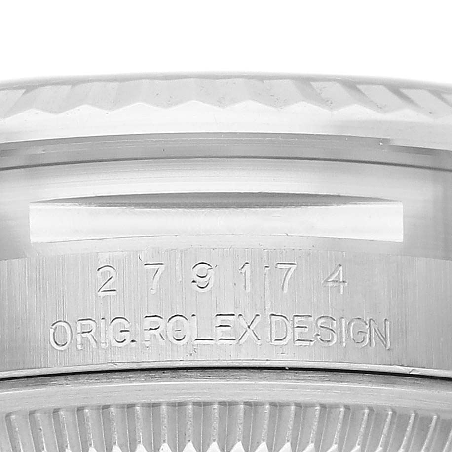 This image shows a close-up of the case side of a Rolex Datejust 279174 Women's Stainless Steel Grey Dial 279174 Women's Stainless Steel Grey Dial watch, featuring the model number and branding inscription.