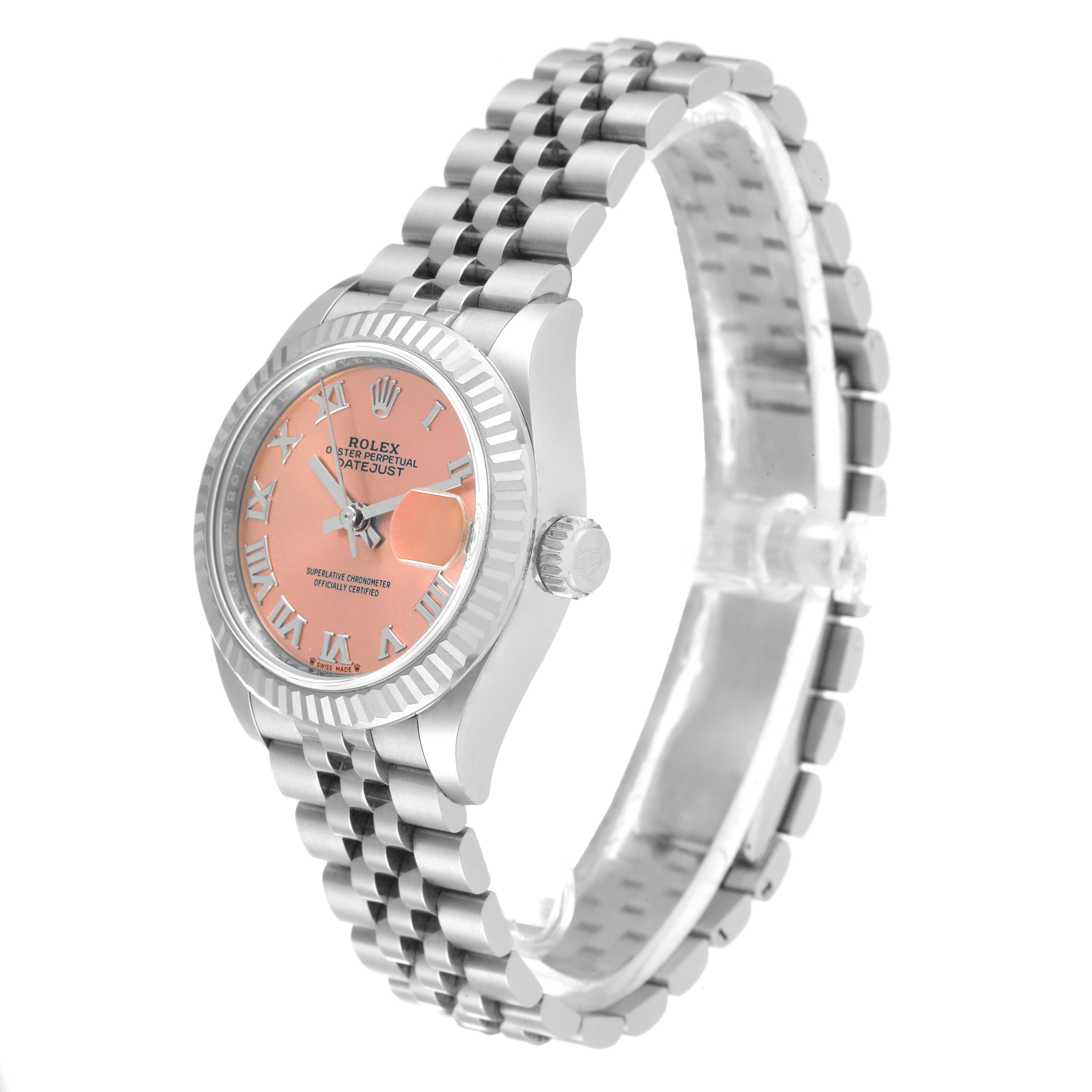 The Rolex Datejust 279174 Women's Stainless Steel Pink Dial 279174 Women's Stainless Steel Pink Dial watch is shown at an angled side view, highlighting its pink dial, fluted bezel, and Jubilee bracelet.