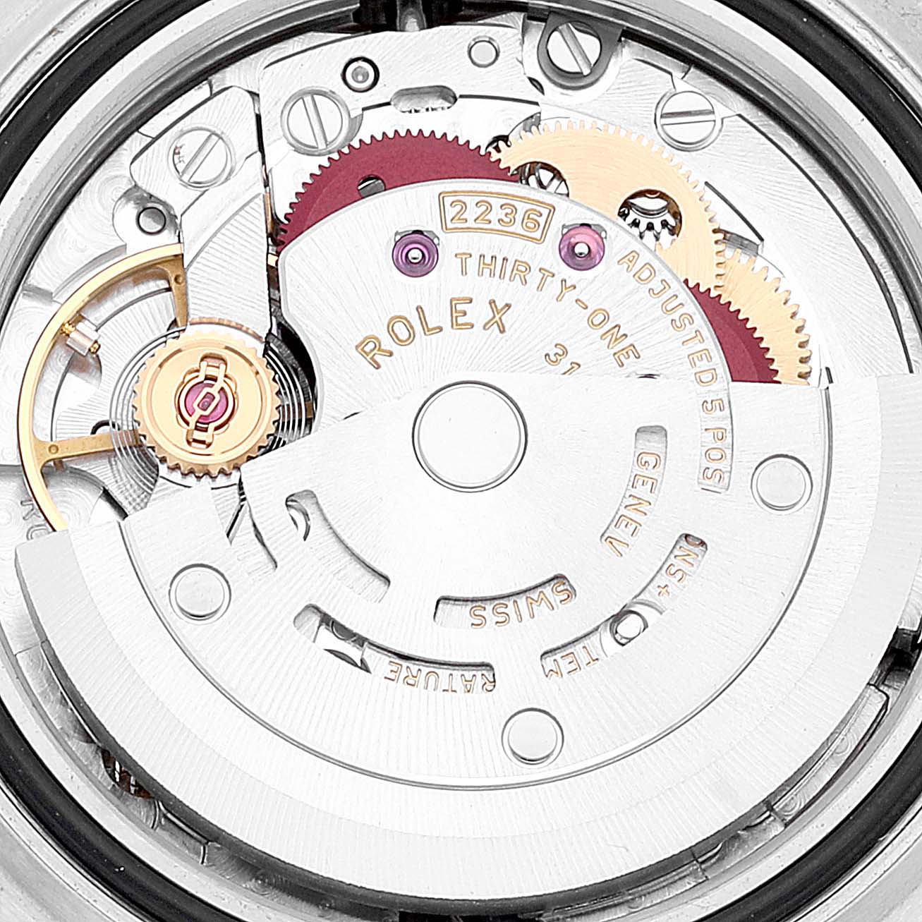 This is a close-up shot of the Rolex Datejust 279174 Women's Stainless Steel Pink Dial 279174 Women's Stainless Steel Pink Dial watch movement, showing intricate gears and components.
