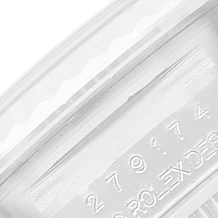 This close-up image shows the serial number engraving on the Rolex Datejust 279174 Women's Stainless Steel Pink Dial 279174 Women's Stainless Steel Pink Dial.