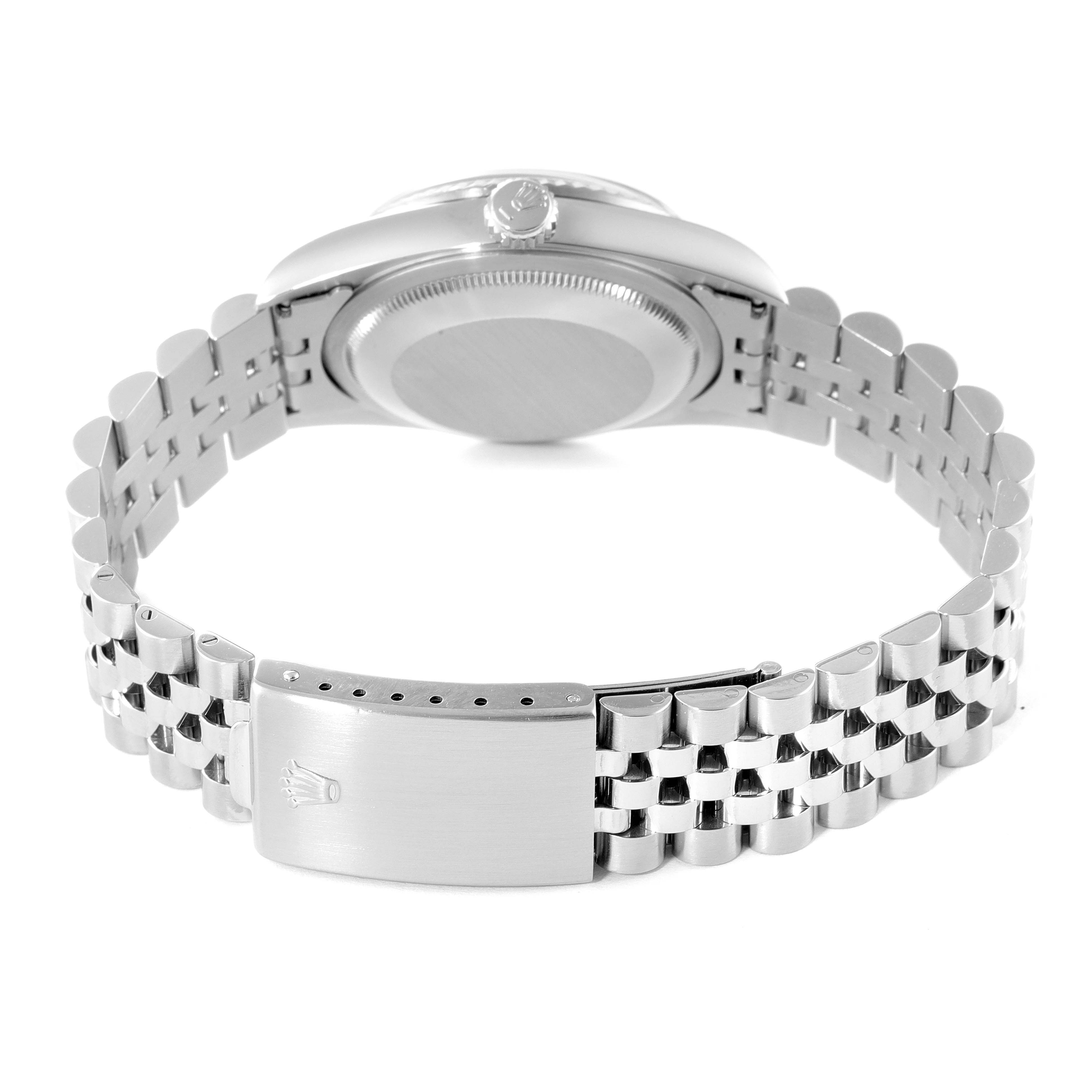 The image shows the back view of a Rolex Datejust 16234 Men's Stainless Steel Black Dial 16234 Men's Stainless Steel Black Dial watch, highlighting its case back, crown, and Jubilee bracelet clasp.