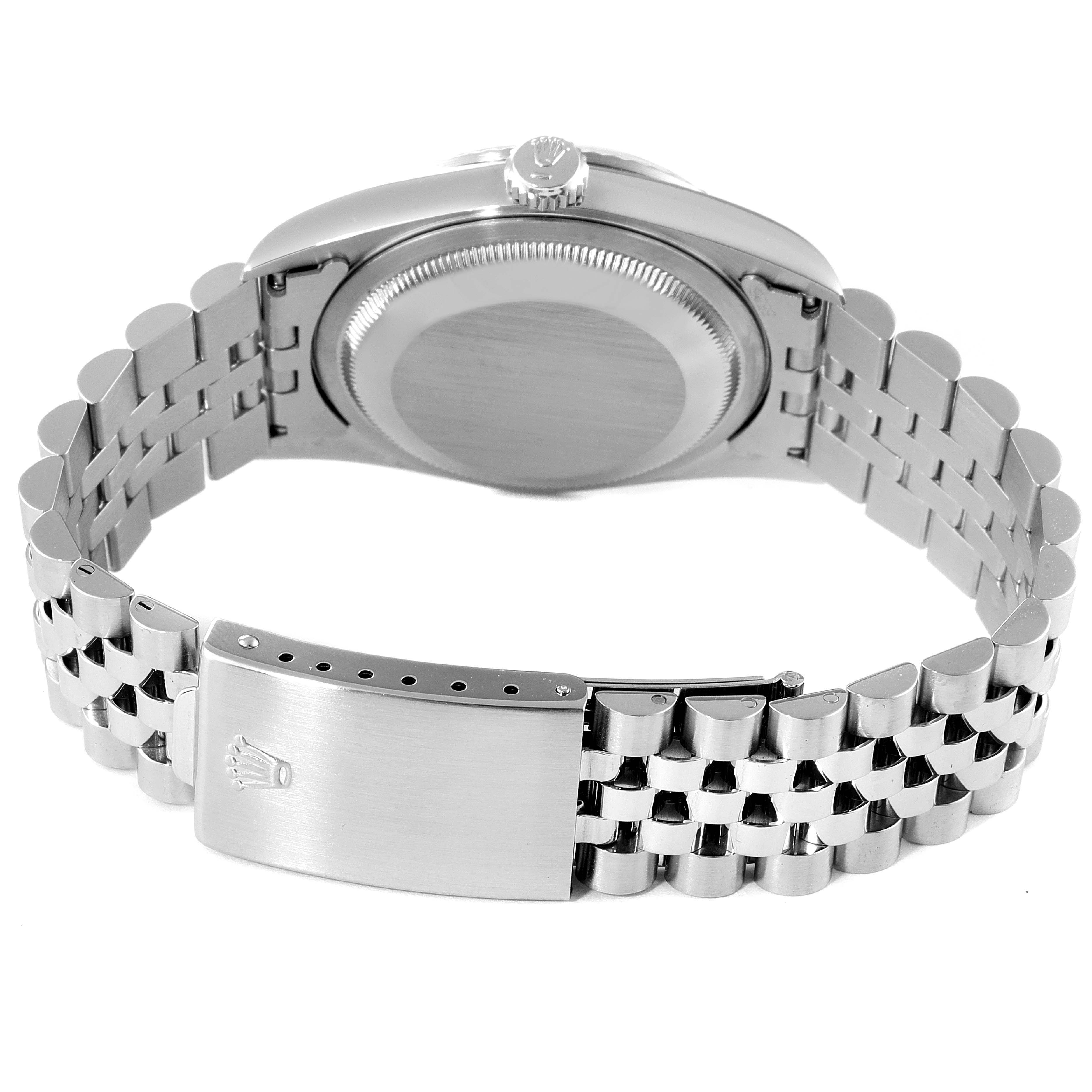 The image shows the backside and bracelet of a Rolex Datejust 16234 Men
s Stainless Steel Black Dial 16234 Men
s Stainless Steel Black Dial watch, highlighting the clasp and case back.