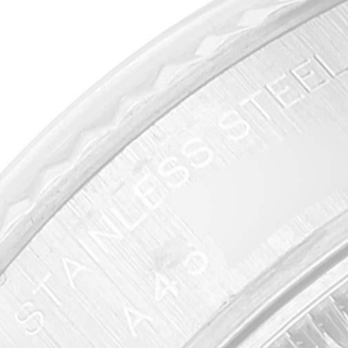 This is a close-up angle of the stainless steel bezel, showing the engraved text on a Rolex Datejust 79174 Women's Stainless Steel Pink Dial 79174 Women's Stainless Steel Pink Dial watch.