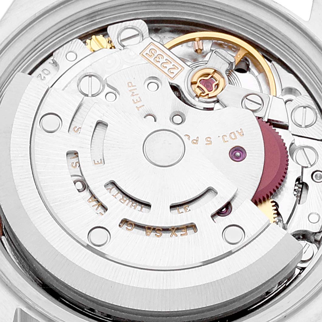 This image shows a close-up of the movement mechanism of a Rolex Datejust 79174 Women's Stainless Steel Pink Dial 79174 Women's Stainless Steel Pink Dial watch.