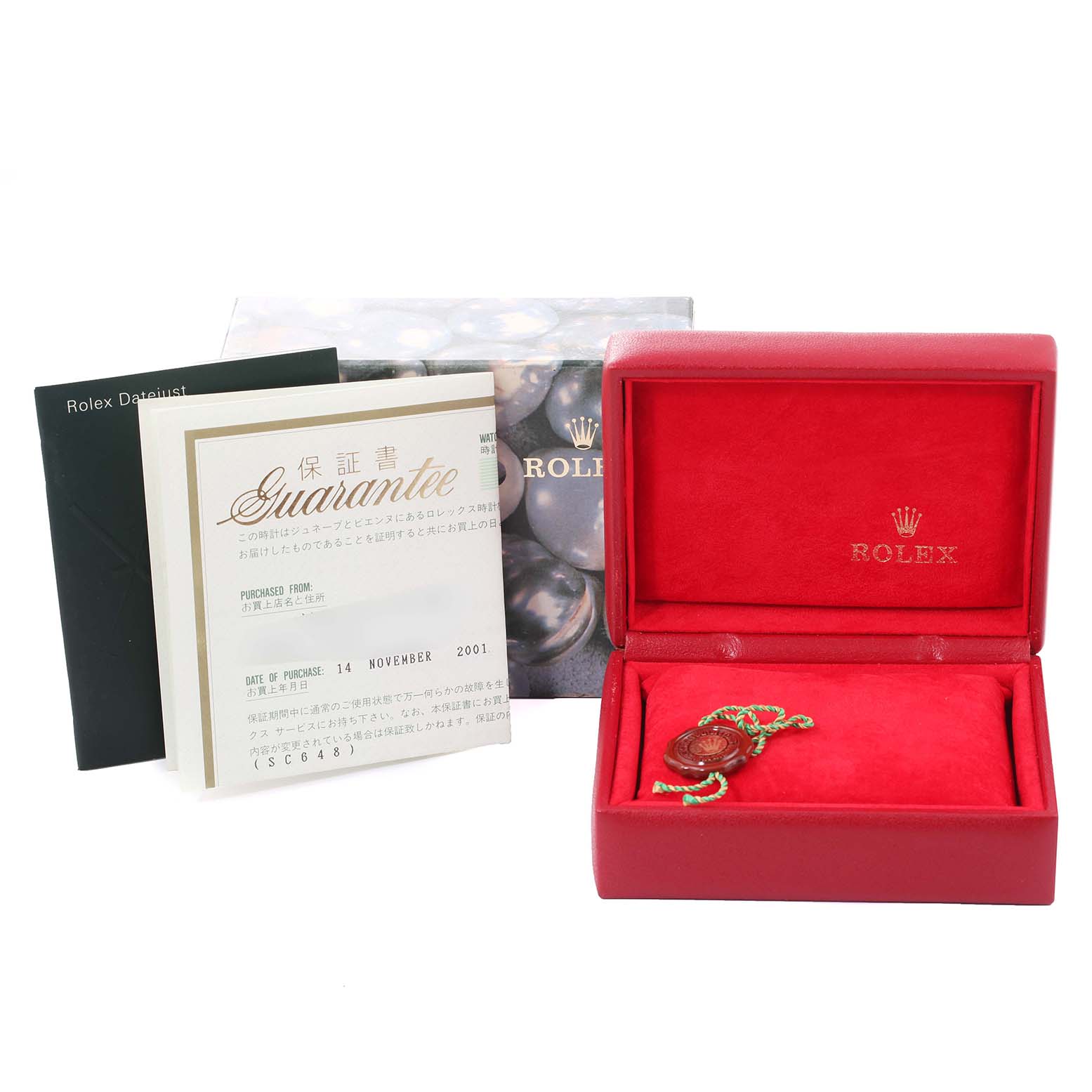 The image shows the box, warranty card, and manual for a Rolex Datejust 79174 Women's Stainless Steel Blue Dial 79174 Women's Stainless Steel Blue Dial watch.