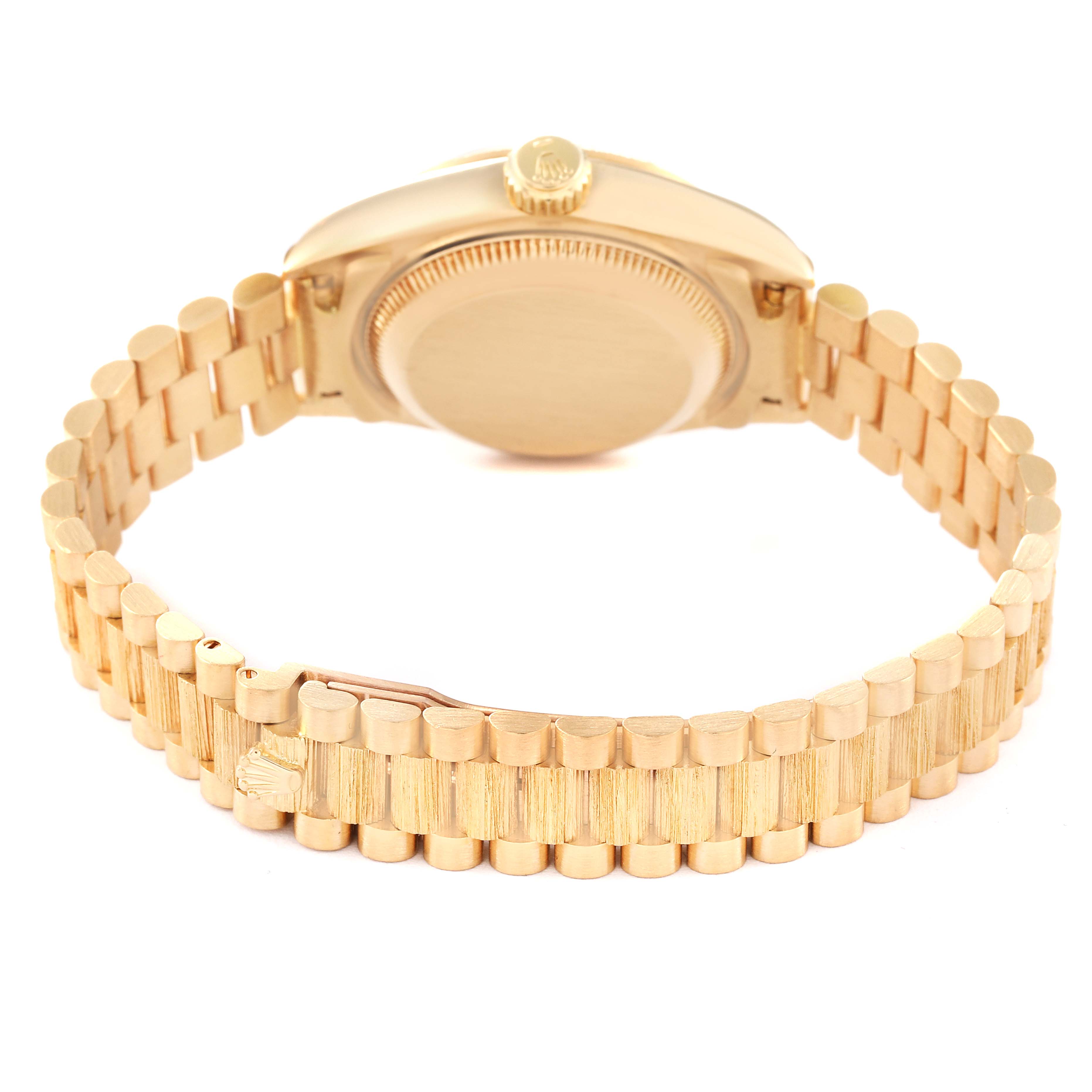 This image shows the back view of a Rolex President 69278 Women's Yellow Gold Champagne Dial 69278 Women's Yellow Gold Champagne Dial model watch, focusing on the caseback, crown, and bracelet.