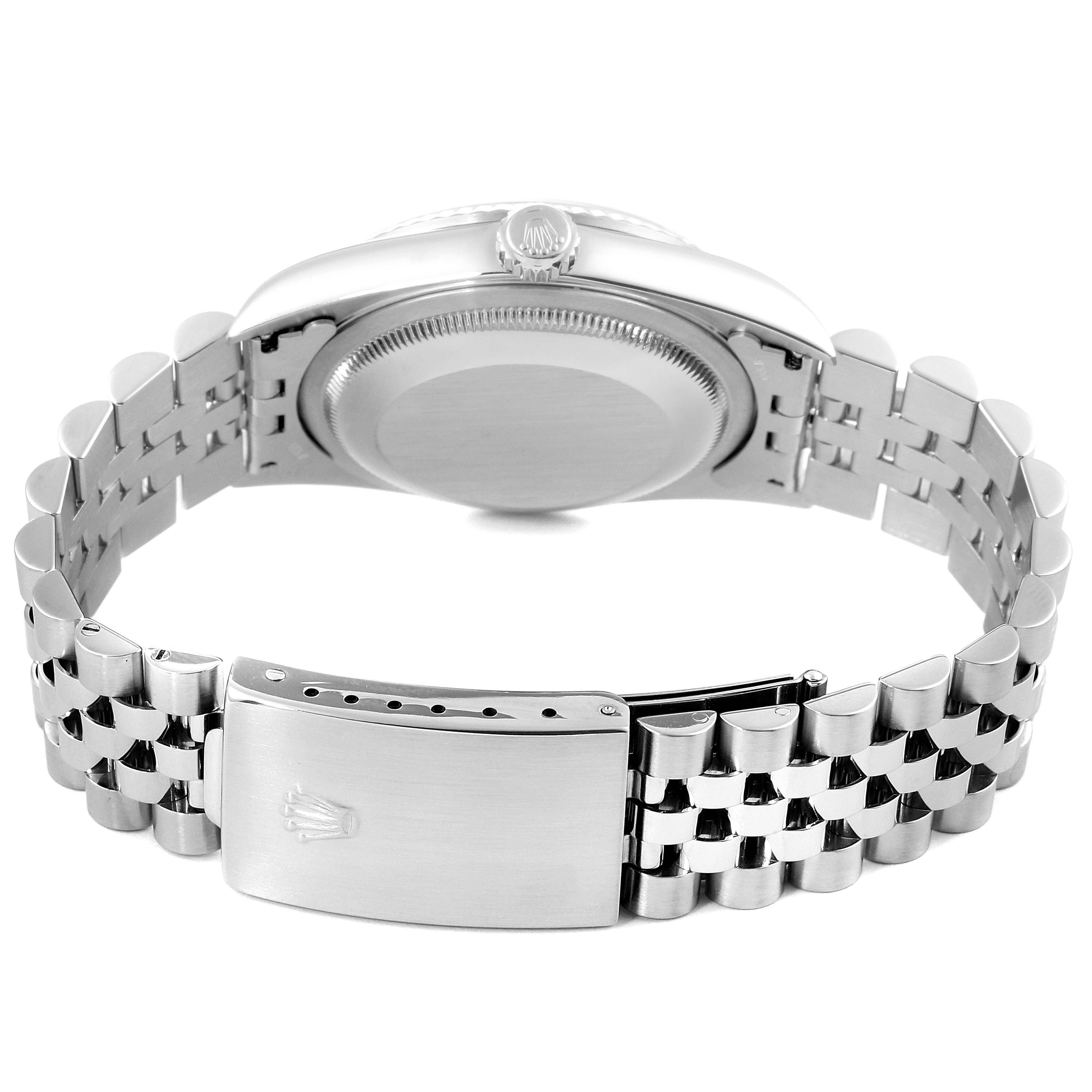 The image shows the back view of a Rolex Datejust 16234 Men's Stainless Steel Black Dial 16234 Men's Stainless Steel Black Dial watch, highlighting its case back and Jubilee bracelet with deployment clasp.