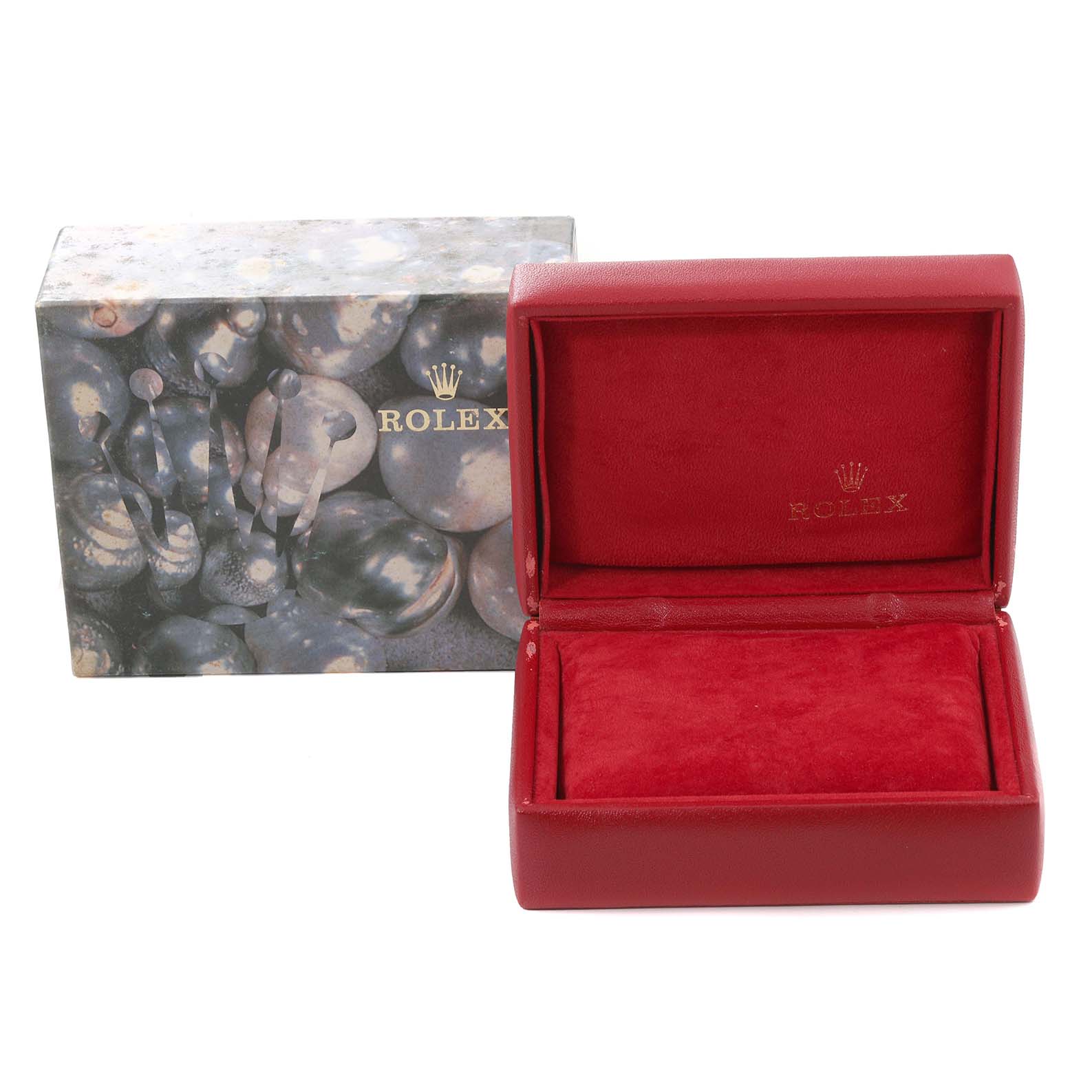 The image shows an empty Rolex Datejust 79174 Women's Stainless Steel Silver Dial 79174 Women's Stainless Steel Silver Dial watch box and its decorative outer packaging.