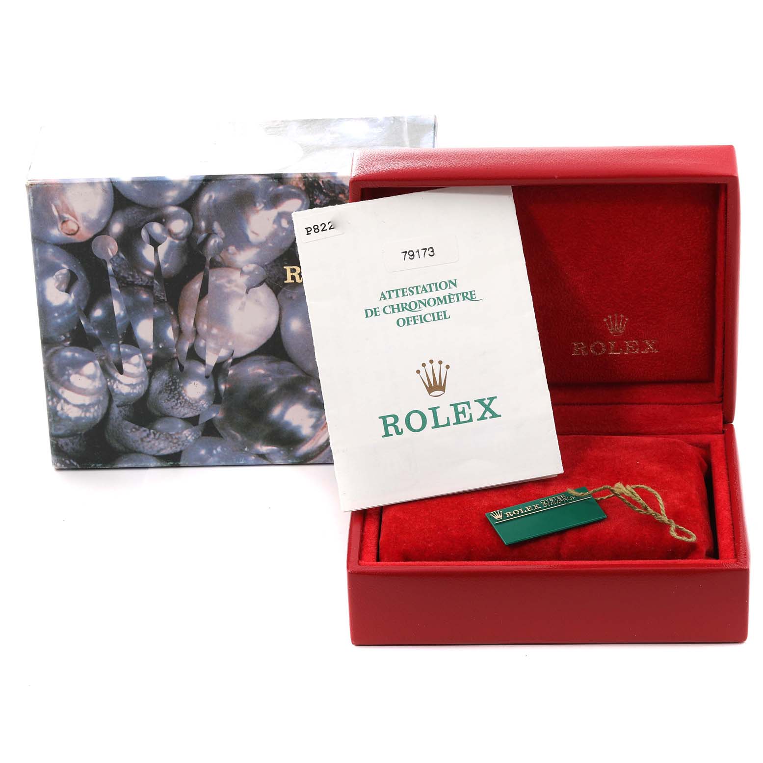 The image shows the packaging and accessories of a Rolex Datejust 79173 Women's Steel and Gold (two tone) Champagne Dial 79173 Women's Steel and Gold (two tone) Champagne Dial model, including a red box and certificate.