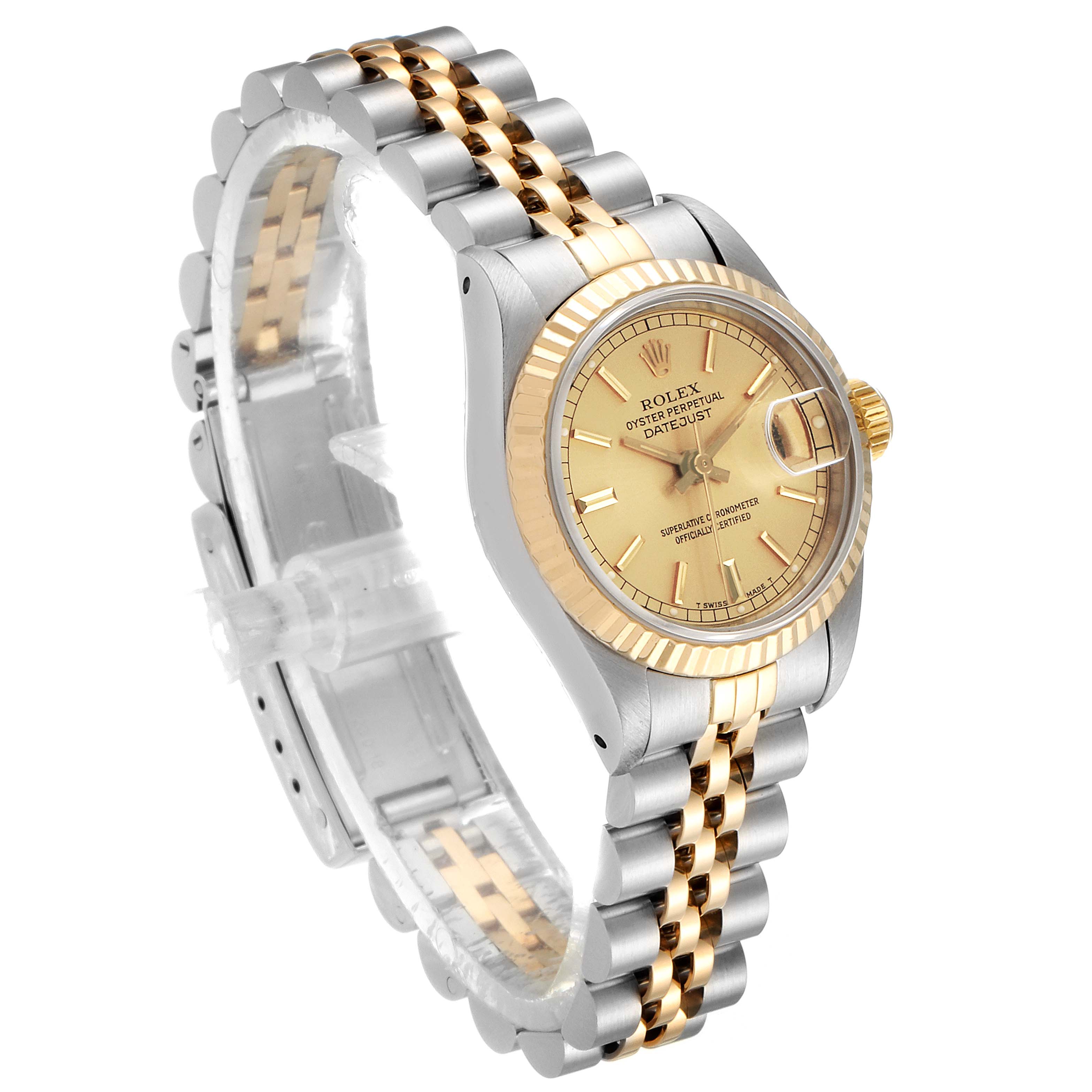 The image shows a Rolex Datejust 69173 Women's Steel and Gold (two tone) Champagne Dial 69173 Women's Steel and Gold (two tone) Champagne Dial watch at a slight angle, highlighting its gold dial, fluted bezel, and two-tone bracelet.