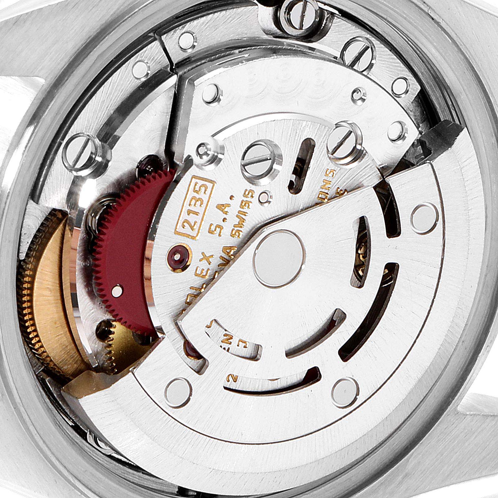 The image shows the internal mechanical movement of a Rolex Datejust 69173 Women's Steel and Gold (two tone) Champagne Dial 69173 Women's Steel and Gold (two tone) Champagne Dial watch from a rear angle, highlighting the rotor and various gears.