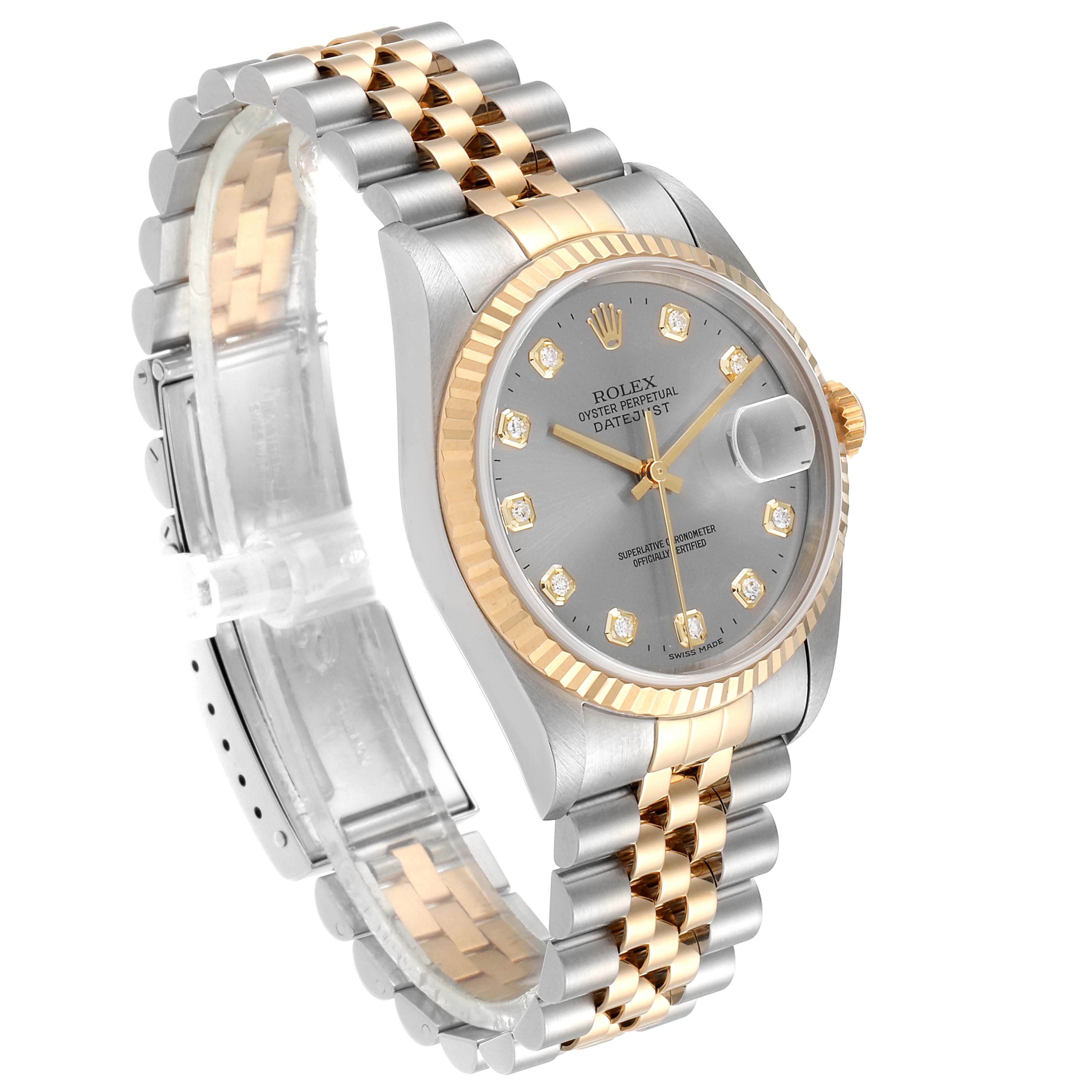 This image shows a Rolex Datejust 16233 Men
s Steel and Gold (two tone) Grey Dial 16233 Men
s Steel and Gold (two tone) Grey Dial watch at a three-quarter angle, highlighting its gold and silver bracelet, fluted bezel, and diamond indices.