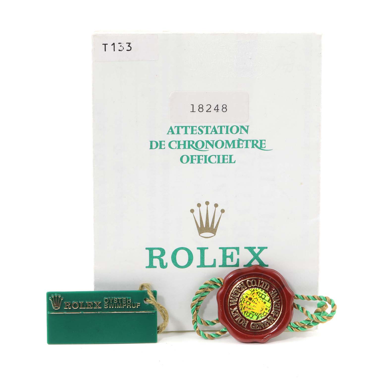 This image shows the certification documents and tags for the Rolex President 18248 Men's Yellow Gold Champagne Dial 18248 Men's Yellow Gold Champagne Dial model watch.