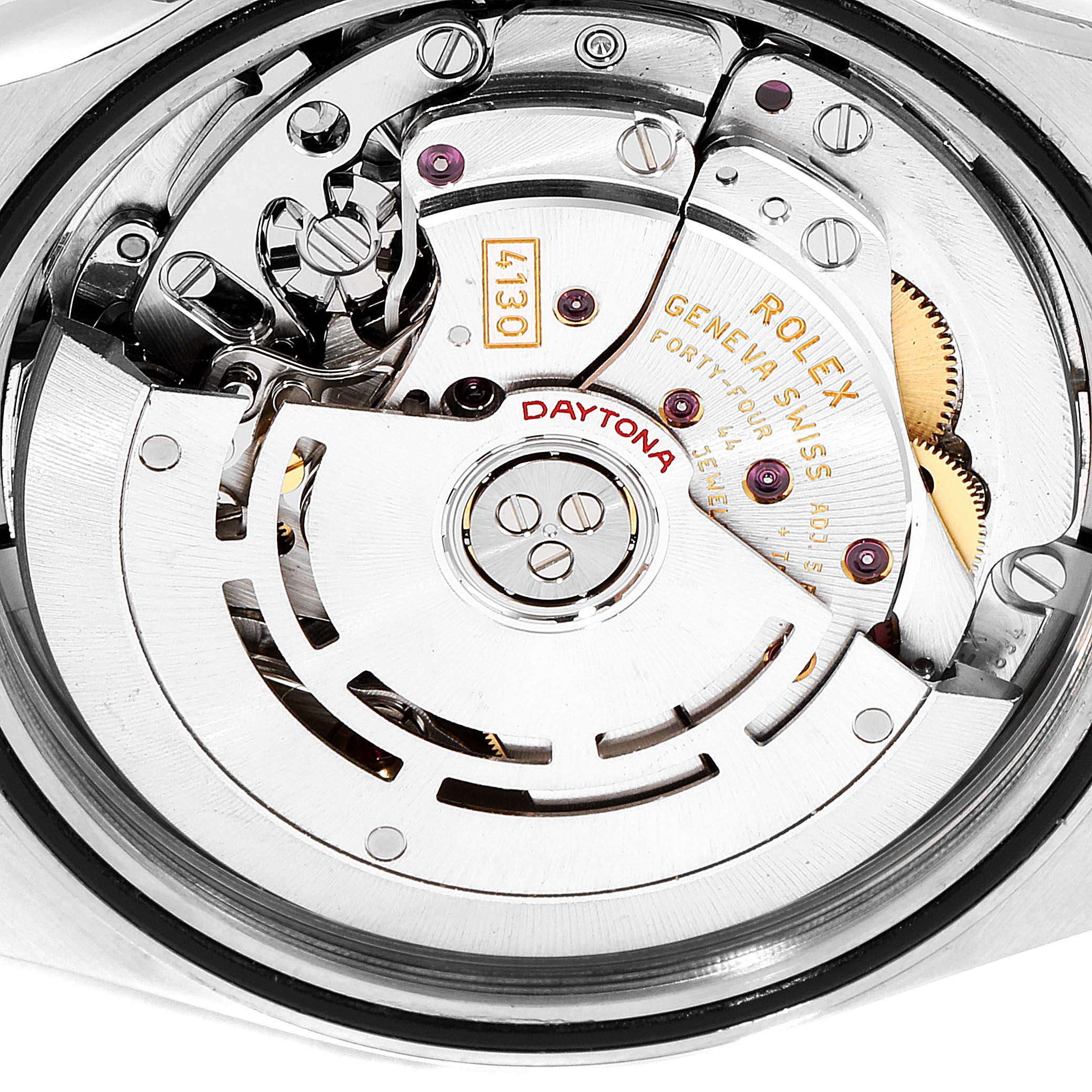 The image shows the intricate movement and inner mechanism of a Rolex Daytona 116520 Men's Stainless Steel Black Dial 116520 Men's Stainless Steel Black Dial watch from a close-up angle.