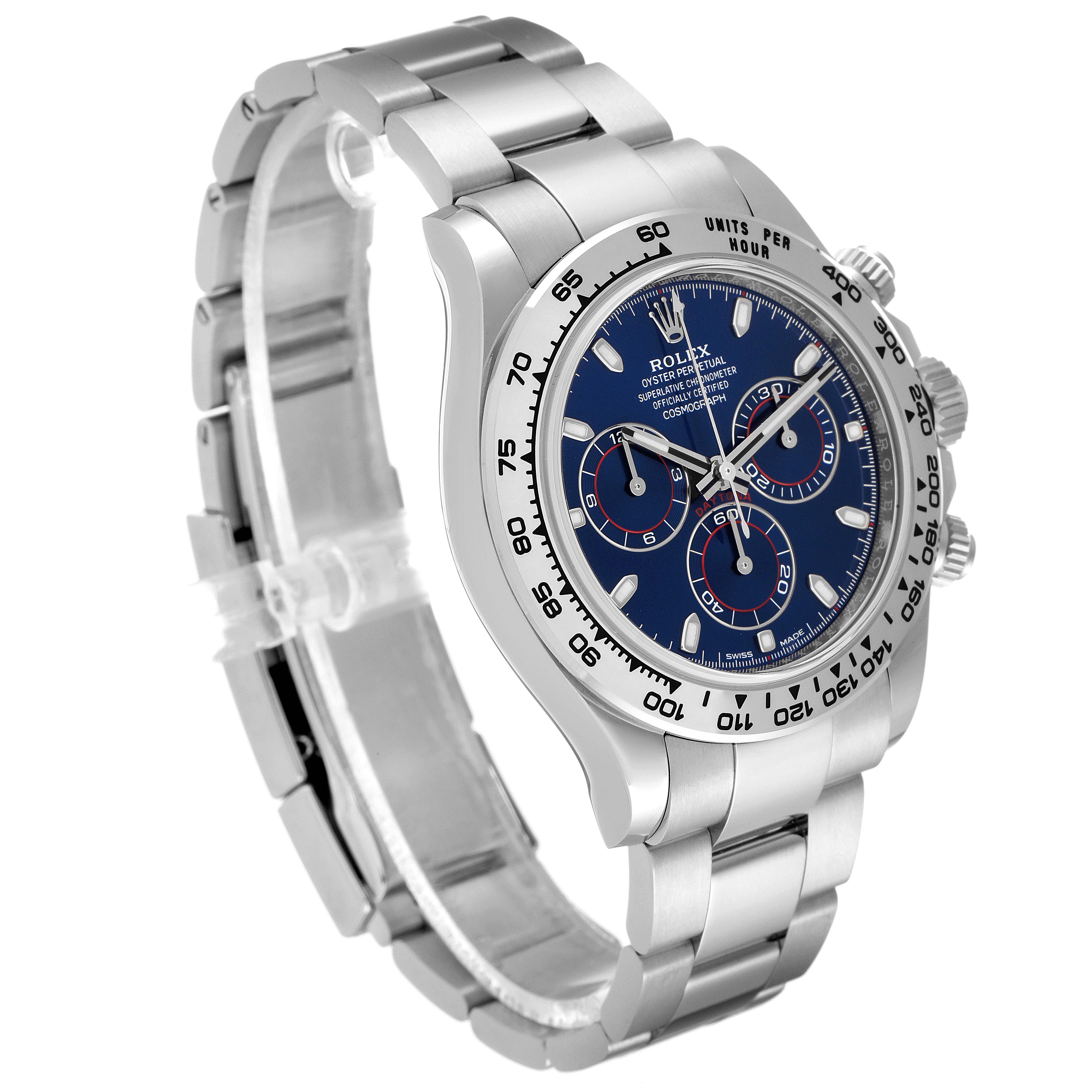 The Rolex Daytona 116509 Men's White Gold Blue Dial 116509 Men's White Gold Blue Dial watch is shown at a three-quarter angle, highlighting its face, three subdials, bezel, and bracelet.