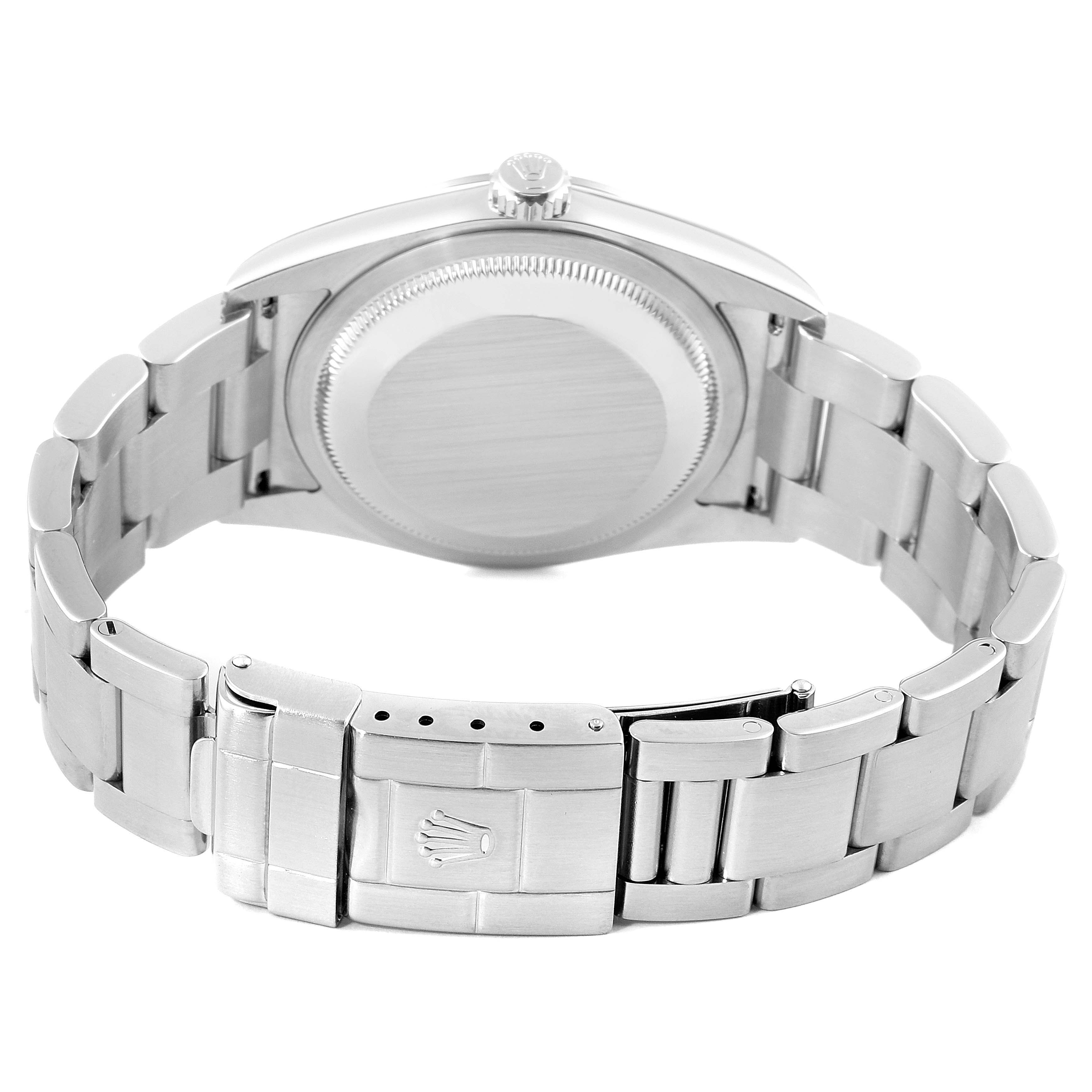 The image shows the back view of a Rolex Explorer 114270 Men
s Stainless Steel Black Dial 114270 Men
s Stainless Steel Black Dial model, highlighting the case back and bracelet clasp.