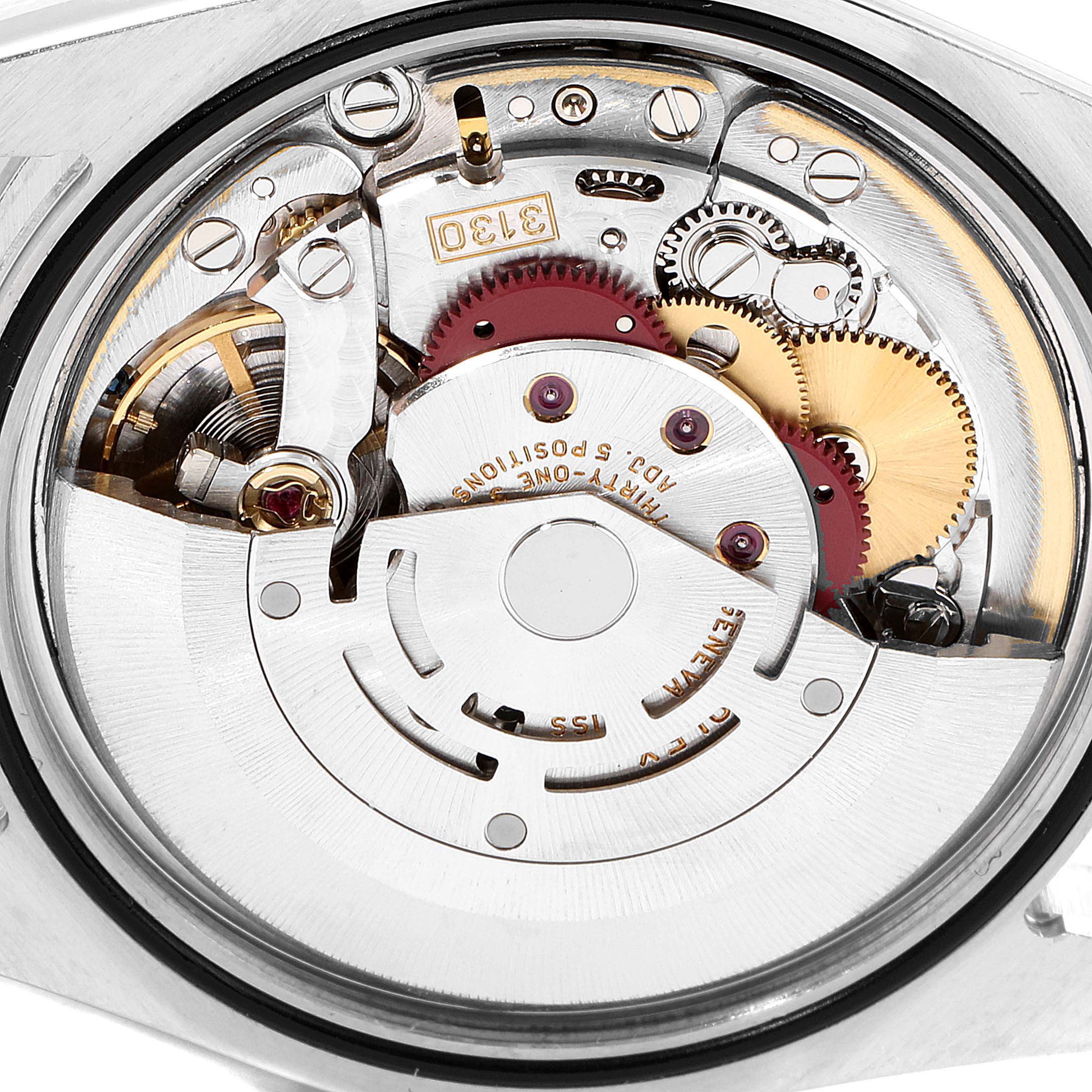 The image shows the internal movement mechanism of a Rolex Explorer 114270 Men
s Stainless Steel Black Dial 114270 Men
s Stainless Steel Black Dial watch from a close-up angle.