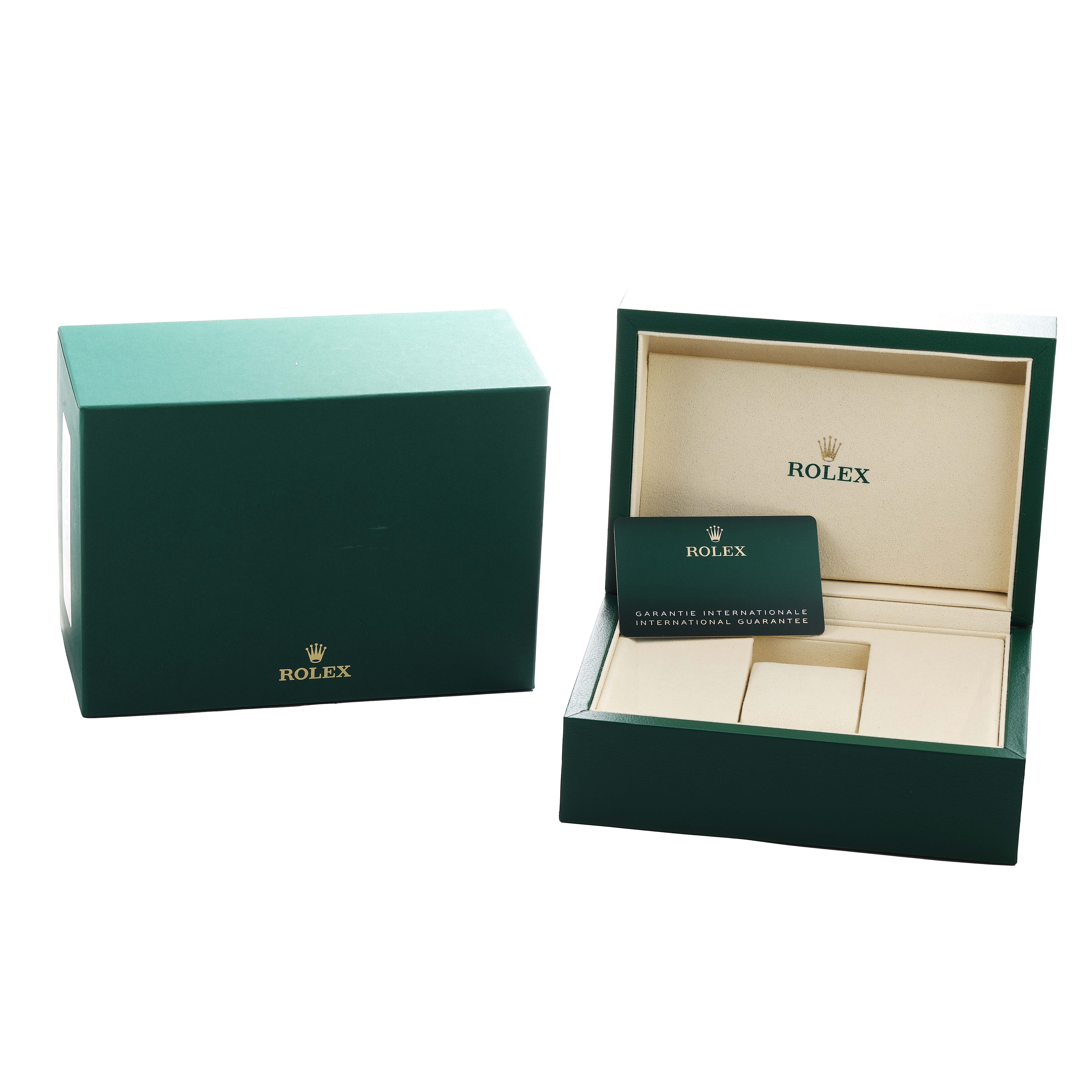 The image shows the Rolex GMT-Master 126710GRNR Men's Stainless Steel Black Dial box and packaging, including an open box displaying the guarantee card.