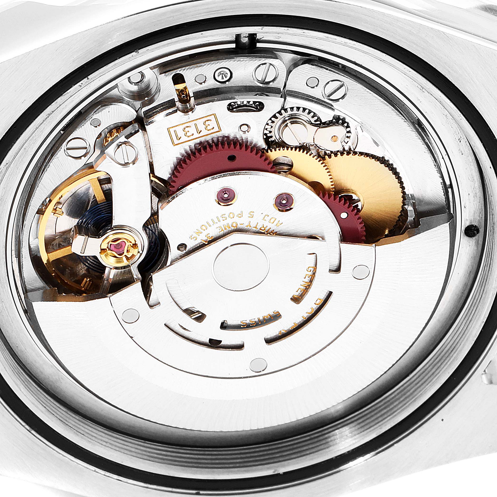 This image shows a close-up of the movement parts inside a Rolex Milgauss 116400GV Men
s Stainless Steel Black Dial 116400GV Men
s Stainless Steel Black Dial watch, highlighting gears and the automatic rotor.