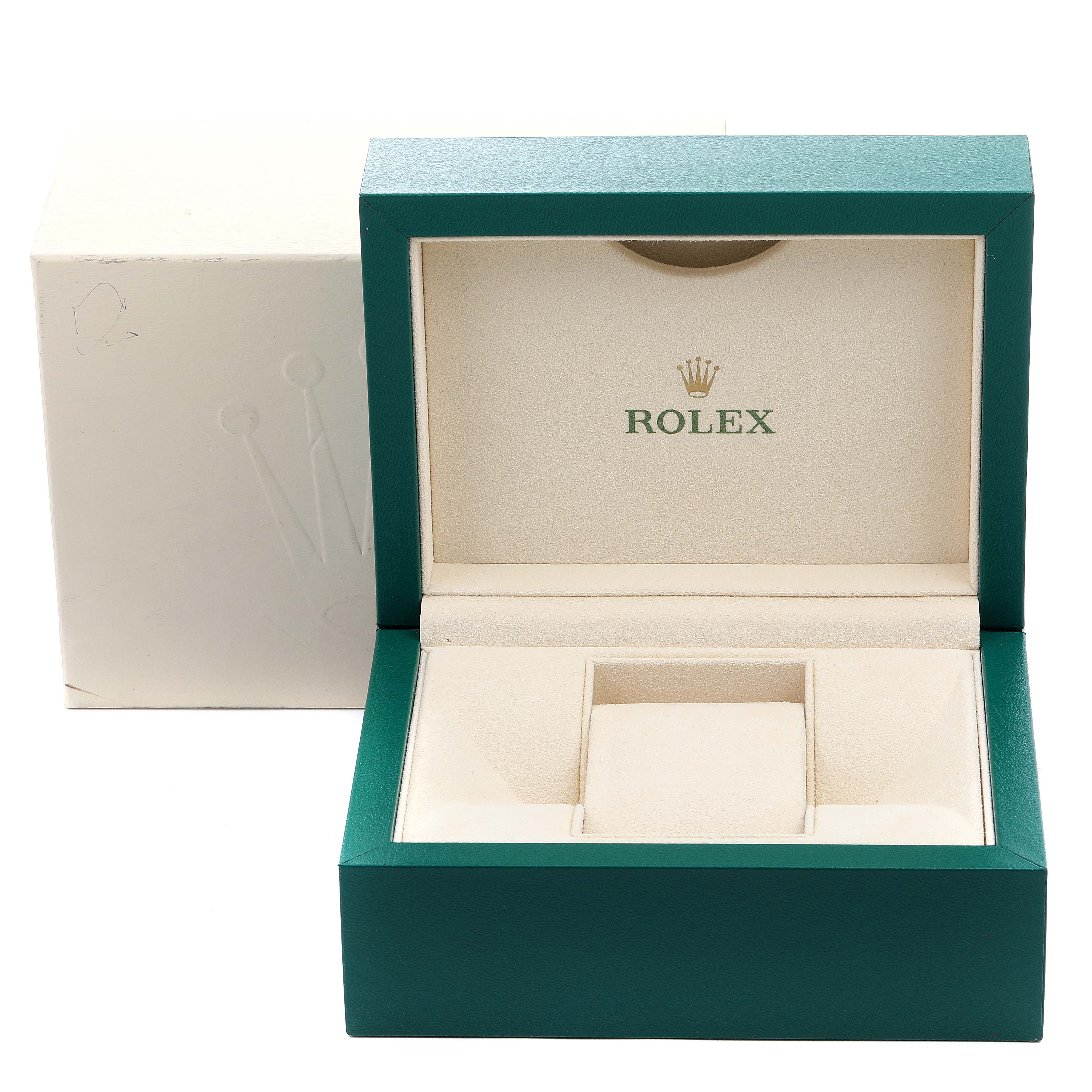 This image shows a green and beige Rolex watch box for the Milgauss model, photographed from the front with the lid open and the outer box visible.