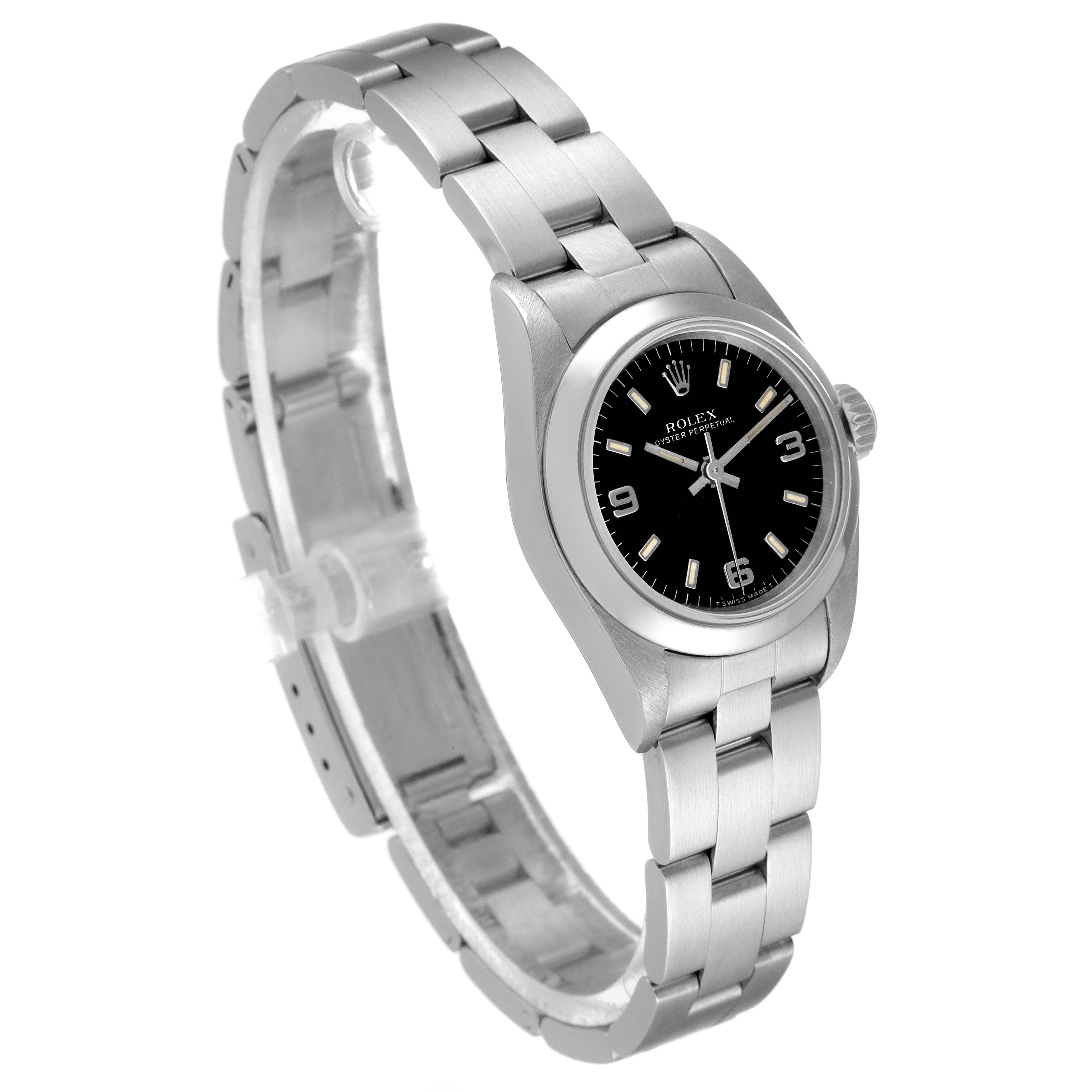 The Rolex Oyster Perpetual 67180 Women's Stainless Steel Black Dial 67180 Women's Stainless Steel Black Dial watch is shown at a three-quarter angle, displaying the face, case, and bracelet.