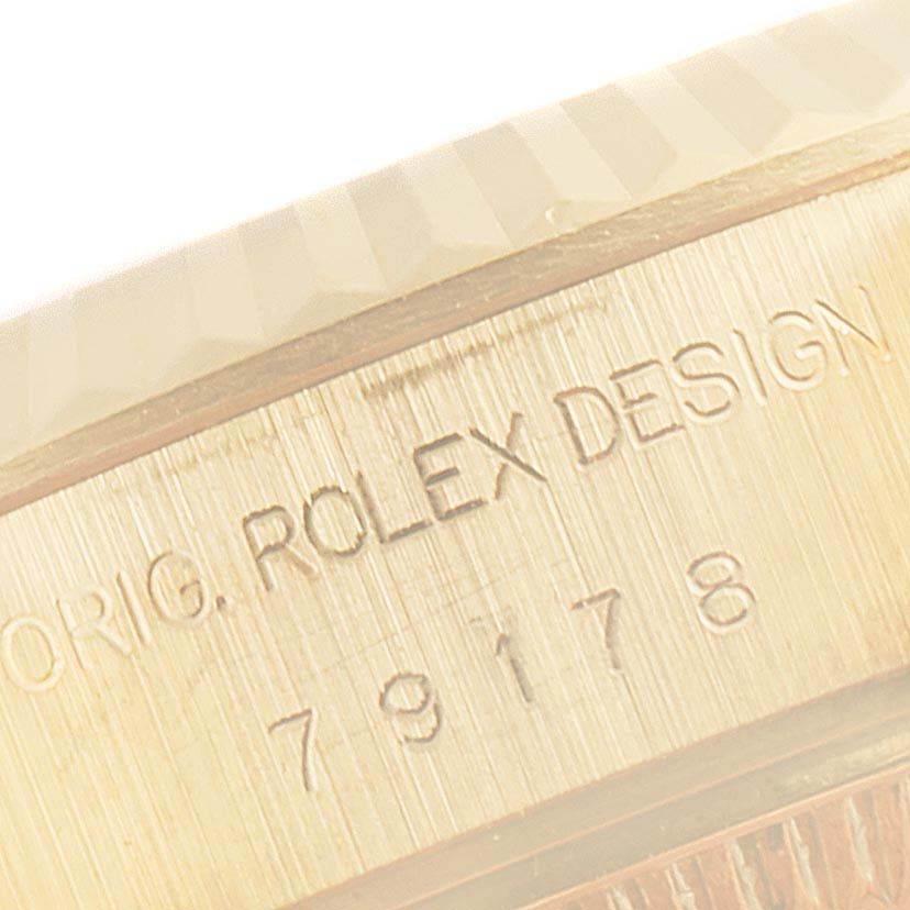This image shows a close-up of the side engraving on a Rolex President 79178 Women's Yellow Gold Silver Dial 79178 Women's Yellow Gold Silver Dial watch, featuring the model number 79178.