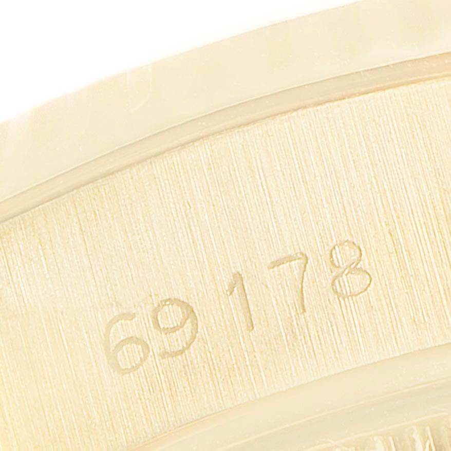 The image shows a close-up angle of the caseback with the model number 69178 of the Rolex President 69178 Women
s Yellow Gold Champagne Dial 69178 Women
s Yellow Gold Champagne Dial watch.