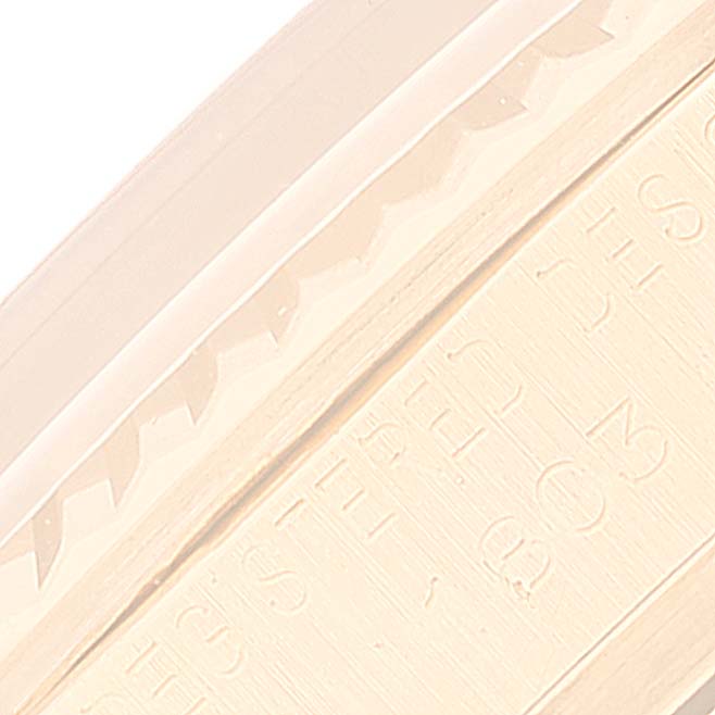 This image shows a close-up angle of the bezel and part of the dial of a Rolex President 1803 Men
s Yellow Gold Champagne Dial 1803 Men
s Yellow Gold Champagne Dial model watch.