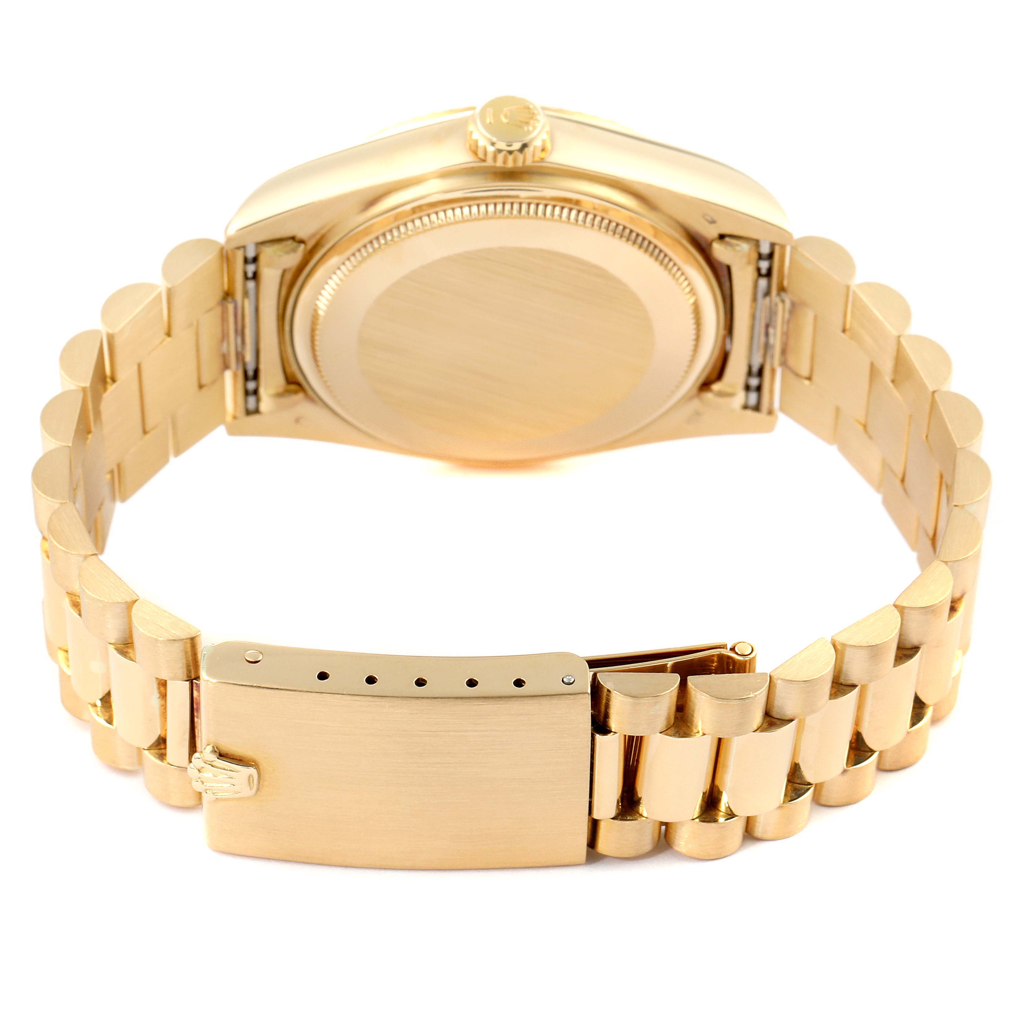 This image shows the rear view of a Rolex President 18038 Men
s Yellow Gold Champagne Dial 18038 Men
s Yellow Gold Champagne Dial watch, highlighting the case back, bracelet, and clasp.