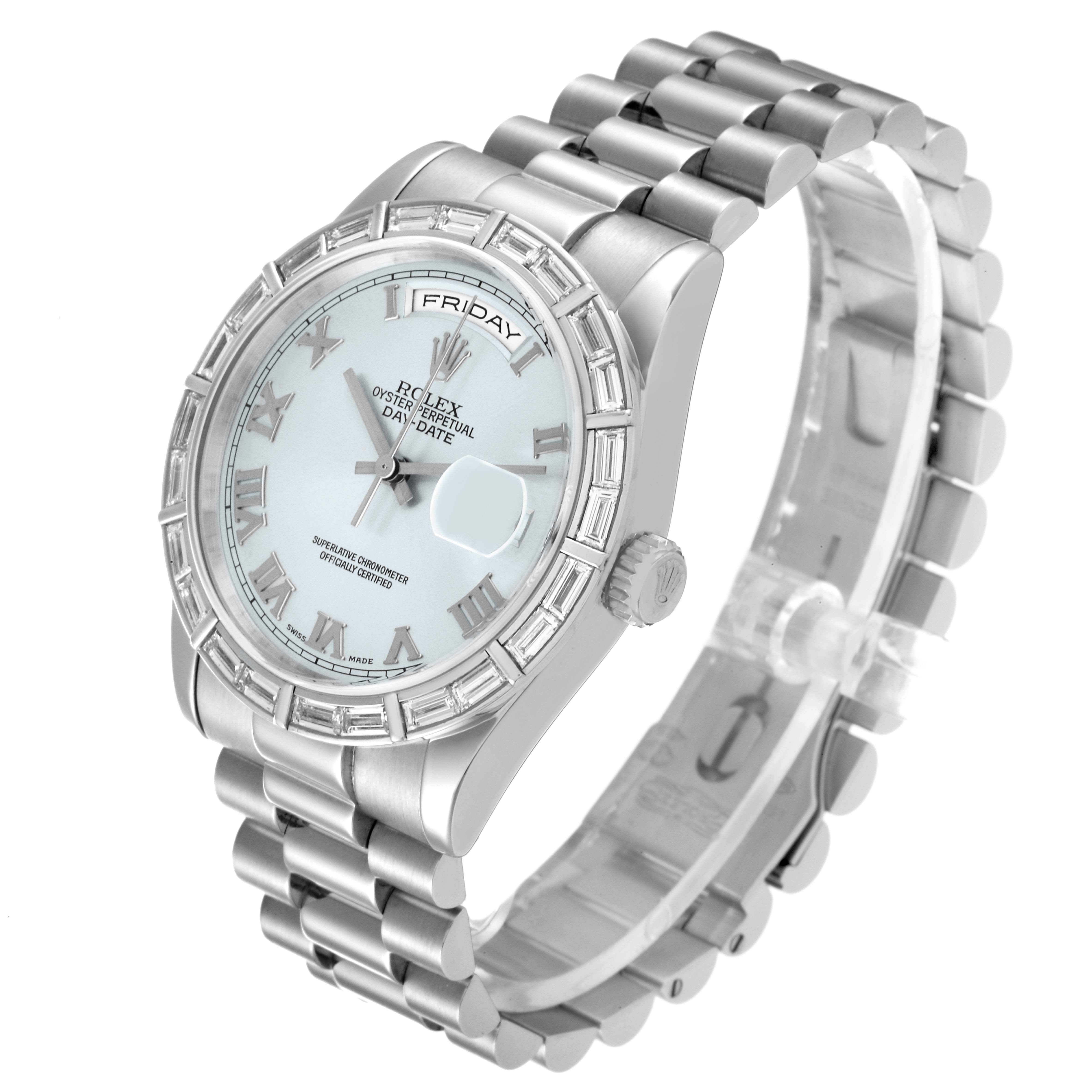The image shows a Rolex President 118366 Men's Platinum Blue Dial model watch at a three-quarter angle, highlighting its silver bracelet, face, and Roman numeral markers.
