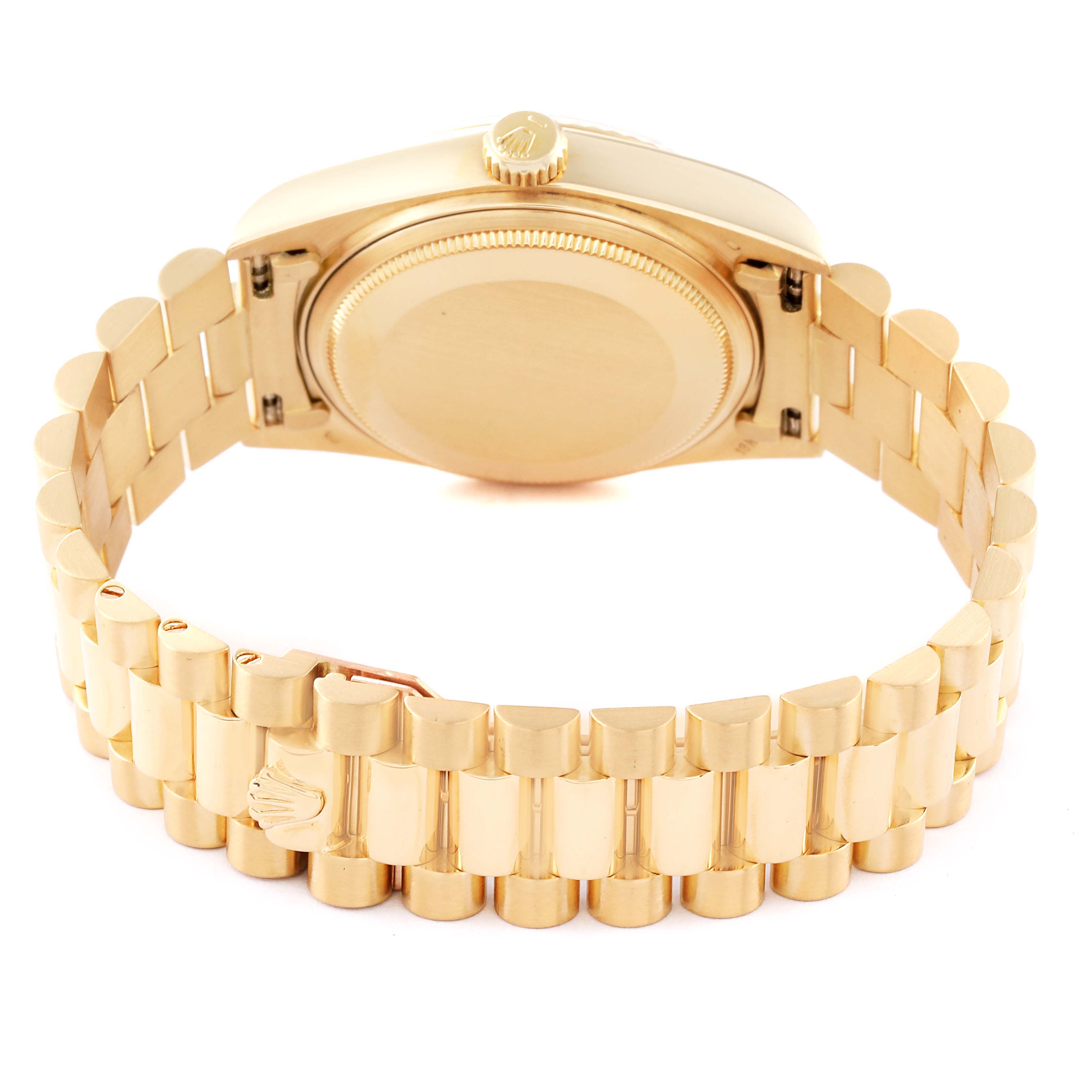 This image shows the back of a gold Rolex President 18038 Men's Yellow Gold Champagne Dial 18038 Men's Yellow Gold Champagne Dial model watch, including the case back and bracelet.