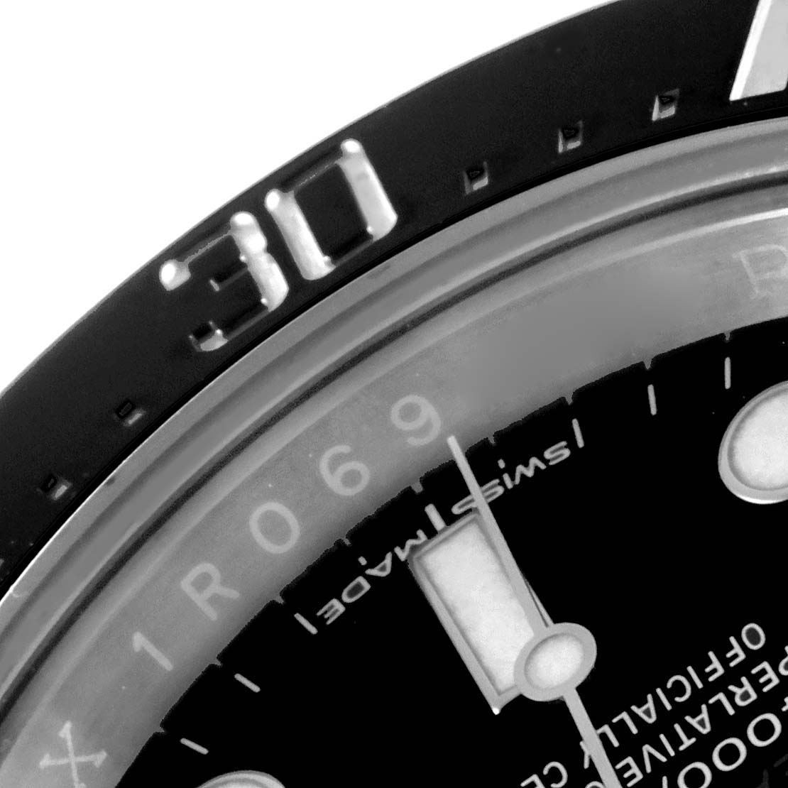 This close-up image shows the bezel, part of the dial, and minute markers of the Rolex Sea-Dweller 126600 Men
s Stainless Steel Black Dial 126600 Men
s Stainless Steel Black Dial watch.